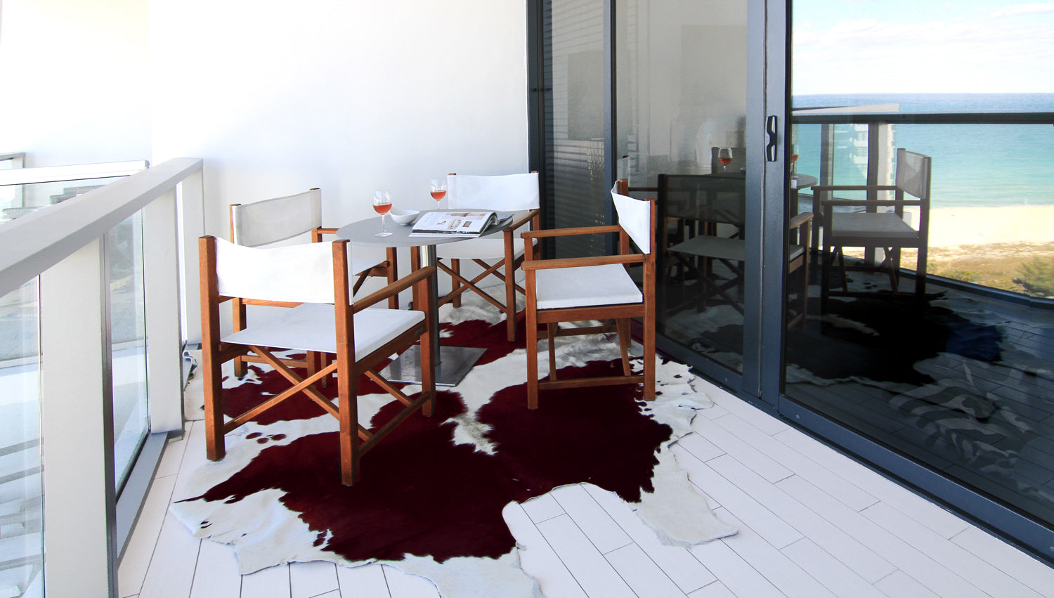 Handmade black and white cowhide area rug measuring 60x84 inches, showcasing a luxurious texture and unique patterns.