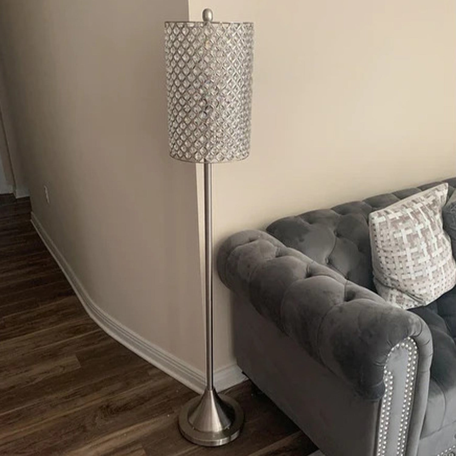 A stylish 62inches Drum Shade Crystal Bead Metal Floor Lamp with a nickel finish base and elegant crystal bead accents, perfect for home decor.