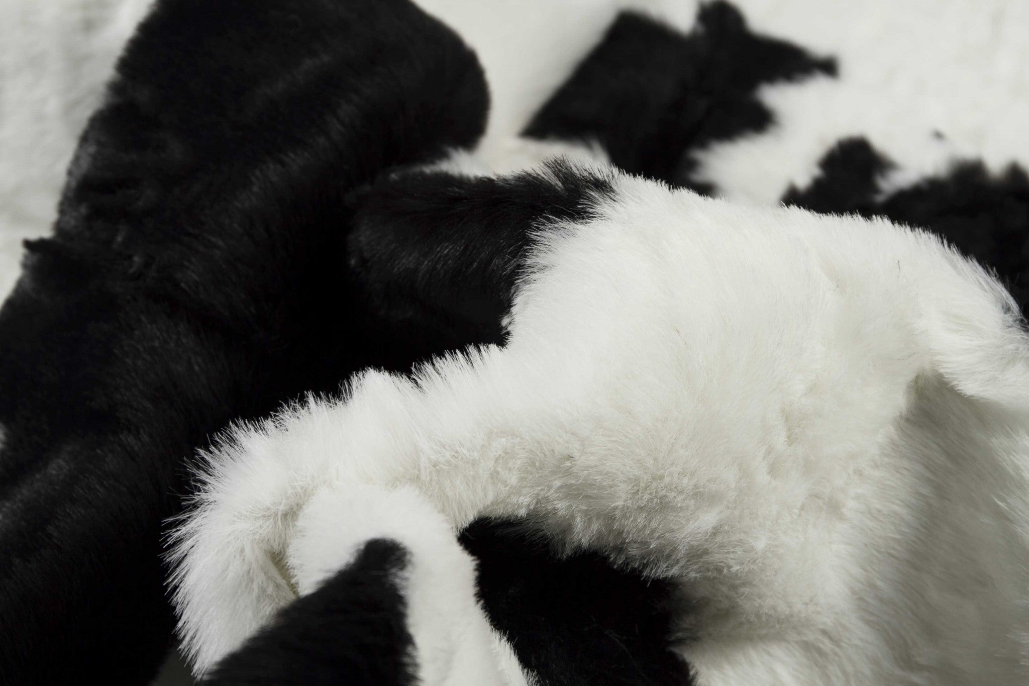 63x90 Sugarland Black and White Faux Hide Area Rug showcasing luxurious texture and contemporary design.