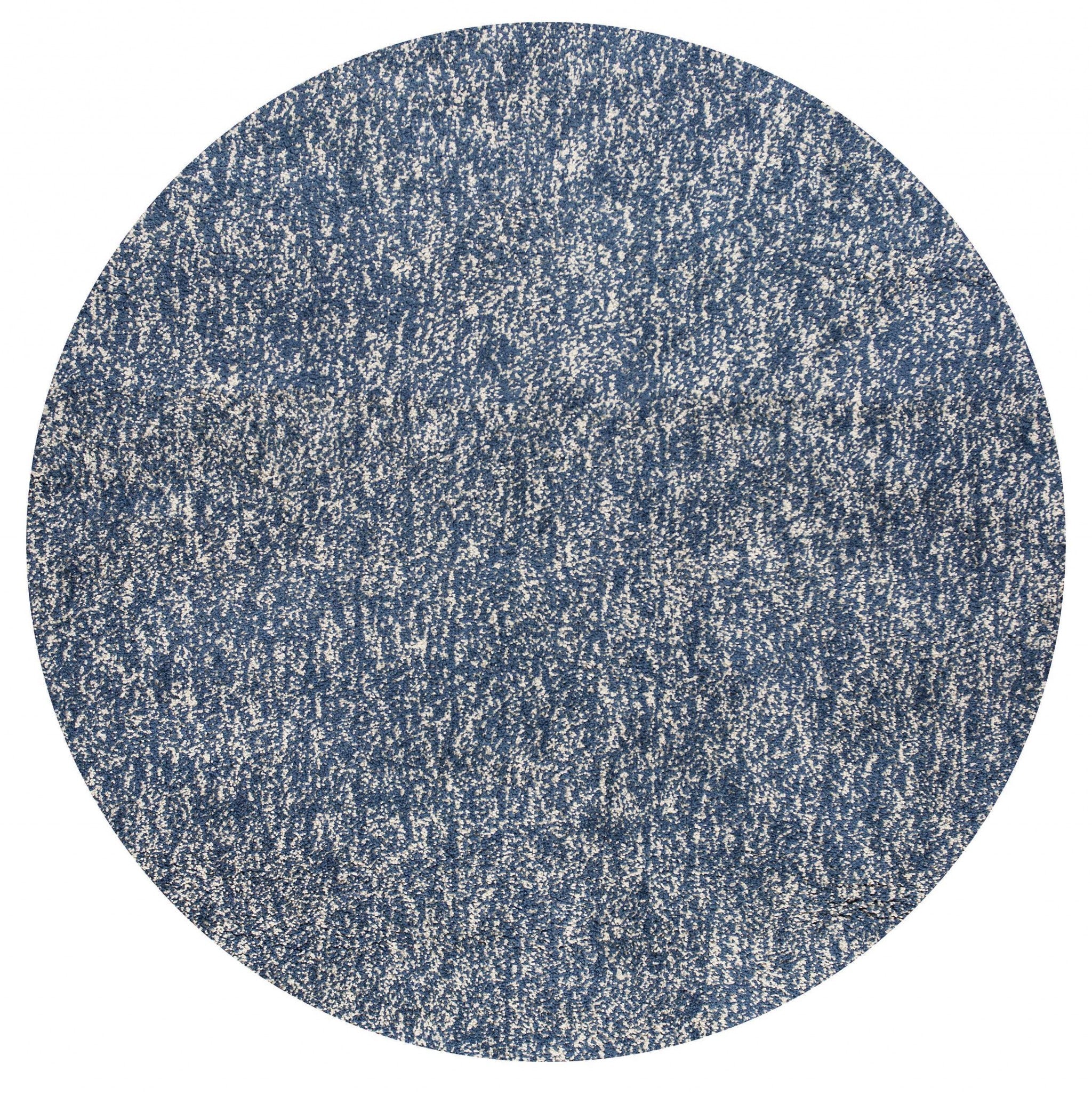 A 6-inch round indoor area rug in indigo and ivory heather, showcasing its elegant design and texture, perfect for enhancing home decor.