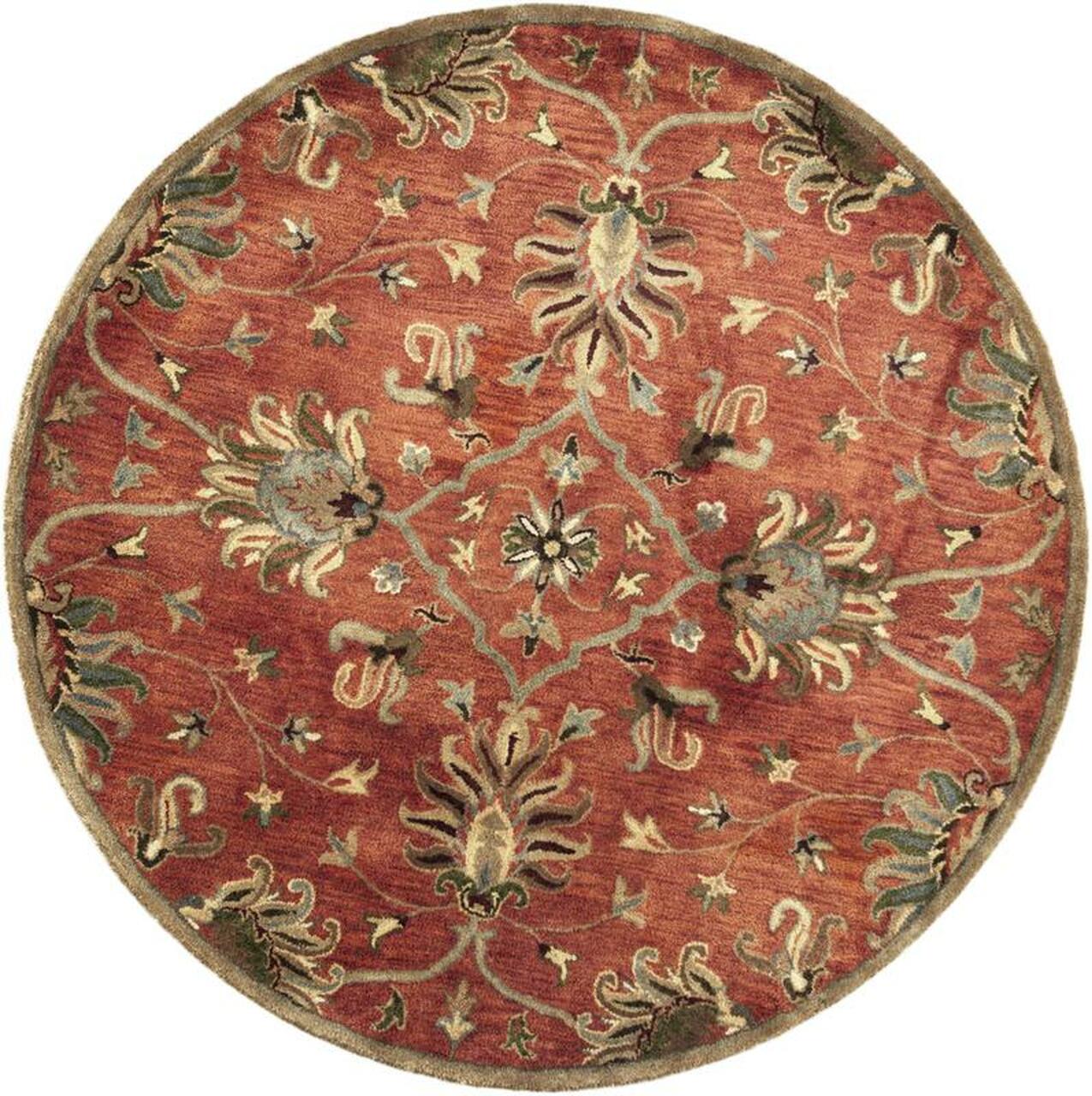 A 6-inch round indoor area rug in sienna orange, hand-tufted from New Zealand wool, showcasing traditional design and soft texture.