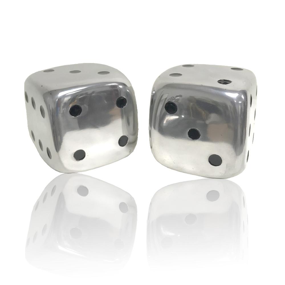 A stylish set of two buffed decorative dice, each measuring 6 inches, made from high-grade aluminum, showcasing a modern design.