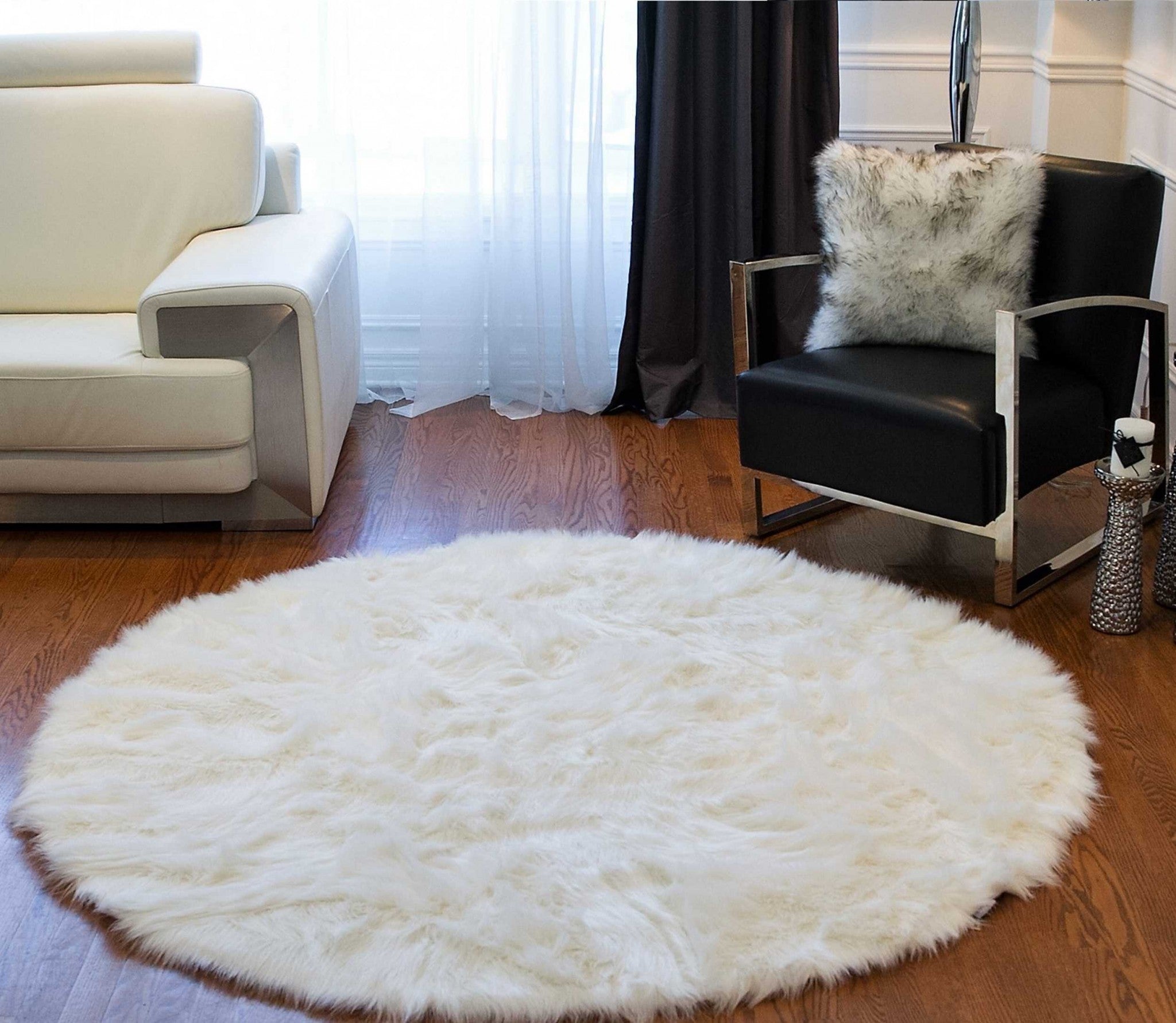 A luxurious 72-inch off white circular faux fur area rug with a soft plush texture, perfect for enhancing living spaces.