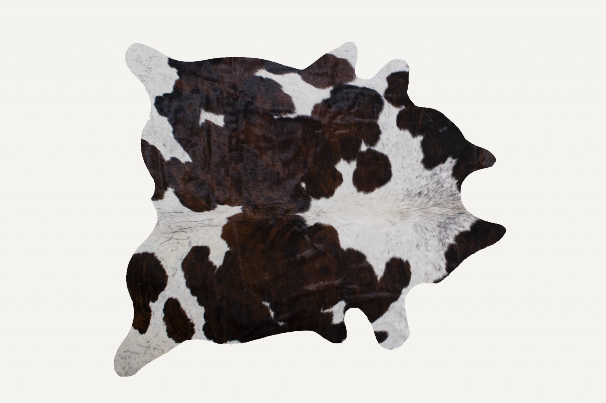 Luxurious 72x84 inches Classic and Brindle Cowhide Rug, showcasing rich colors and soft texture, perfect for enhancing home decor.