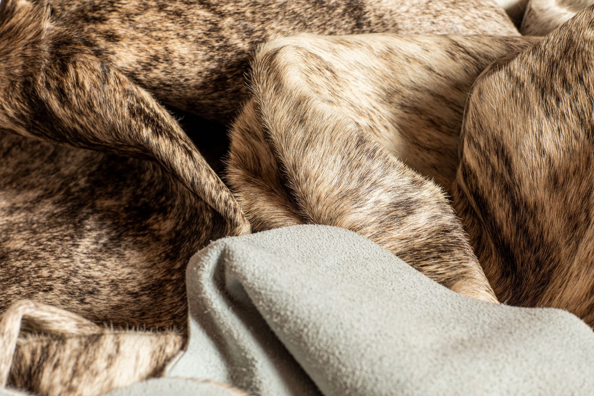 Luxurious 72x84 inches Classic and Brindle Cowhide Rug, showcasing rich colors and soft texture, perfect for enhancing home decor.