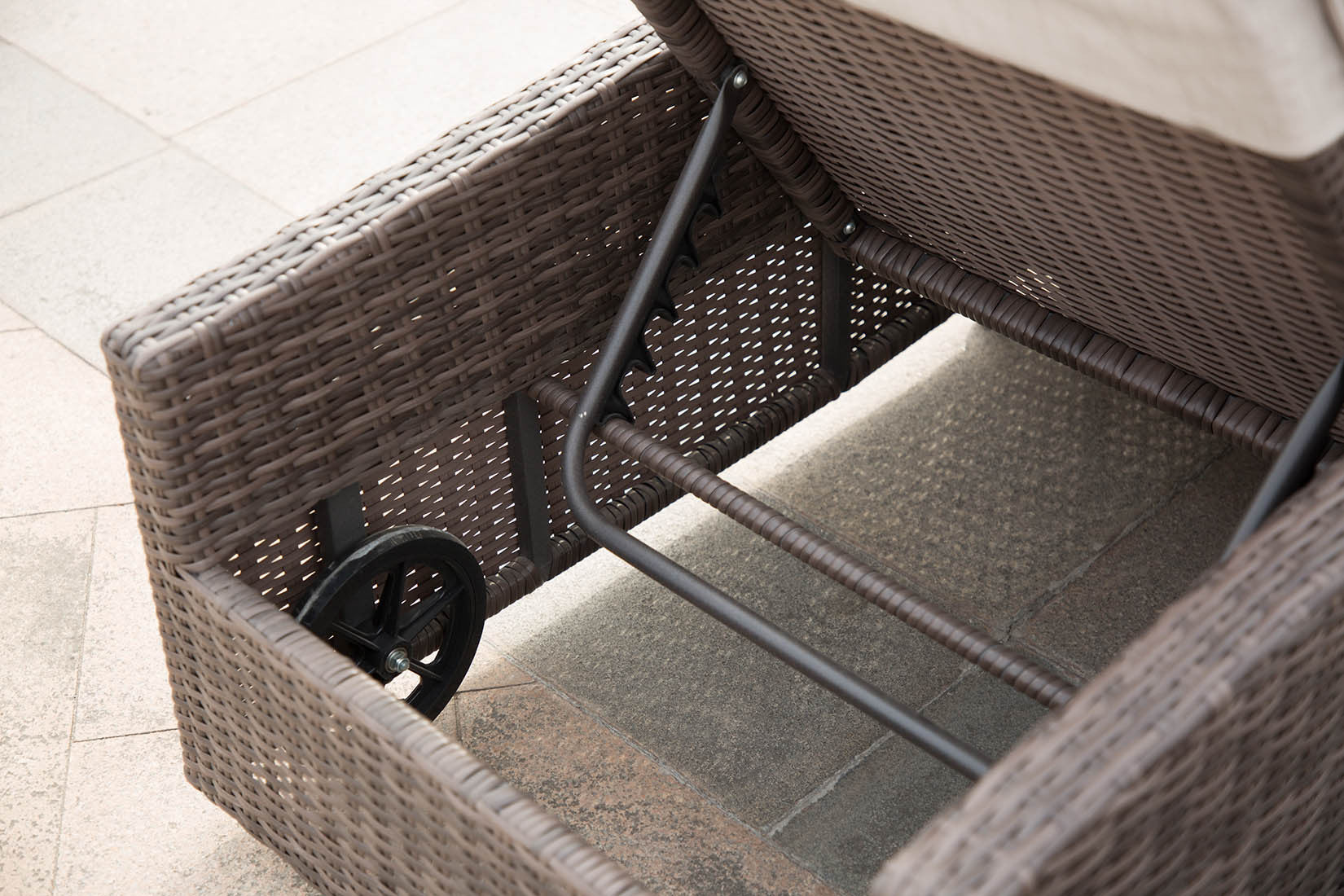 Brown 3-Piece Outdoor Arm Chaise Lounge set featuring two lounges with cushions and a glass-top table, perfect for outdoor relaxation.