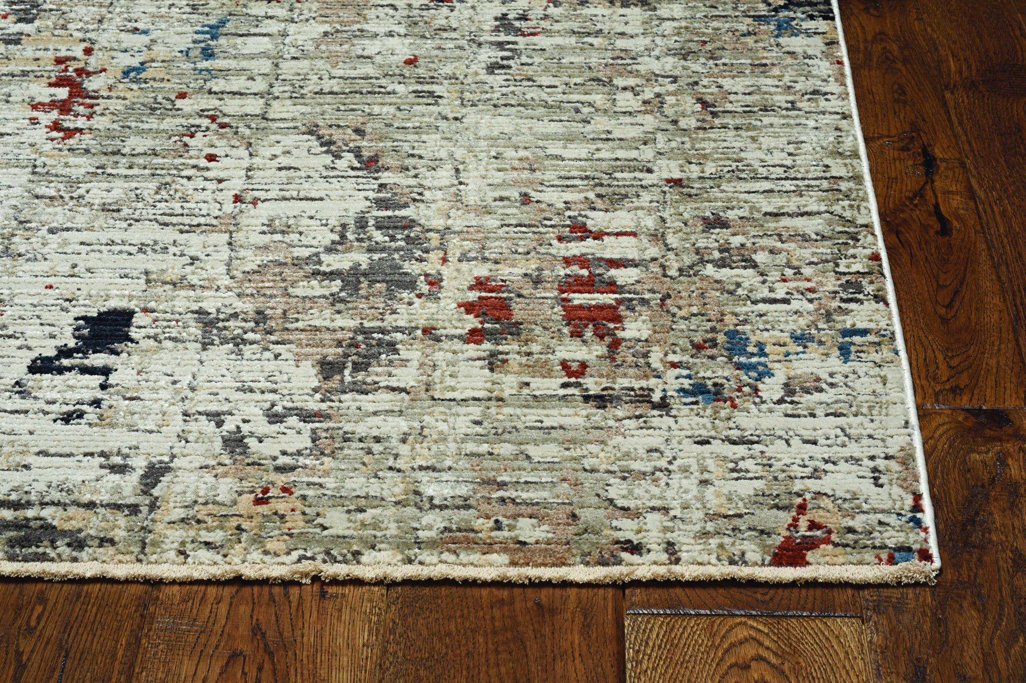 7-inch beige grey machine woven runner rug with abstract design, showcasing texture and fringe details, perfect for indoor use.