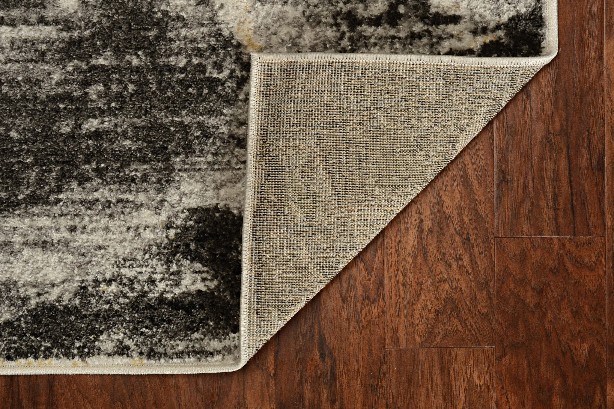 7 inches grey machine woven indoor runner rug featuring a vibrant watercolor splash design, perfect for enhancing home decor.