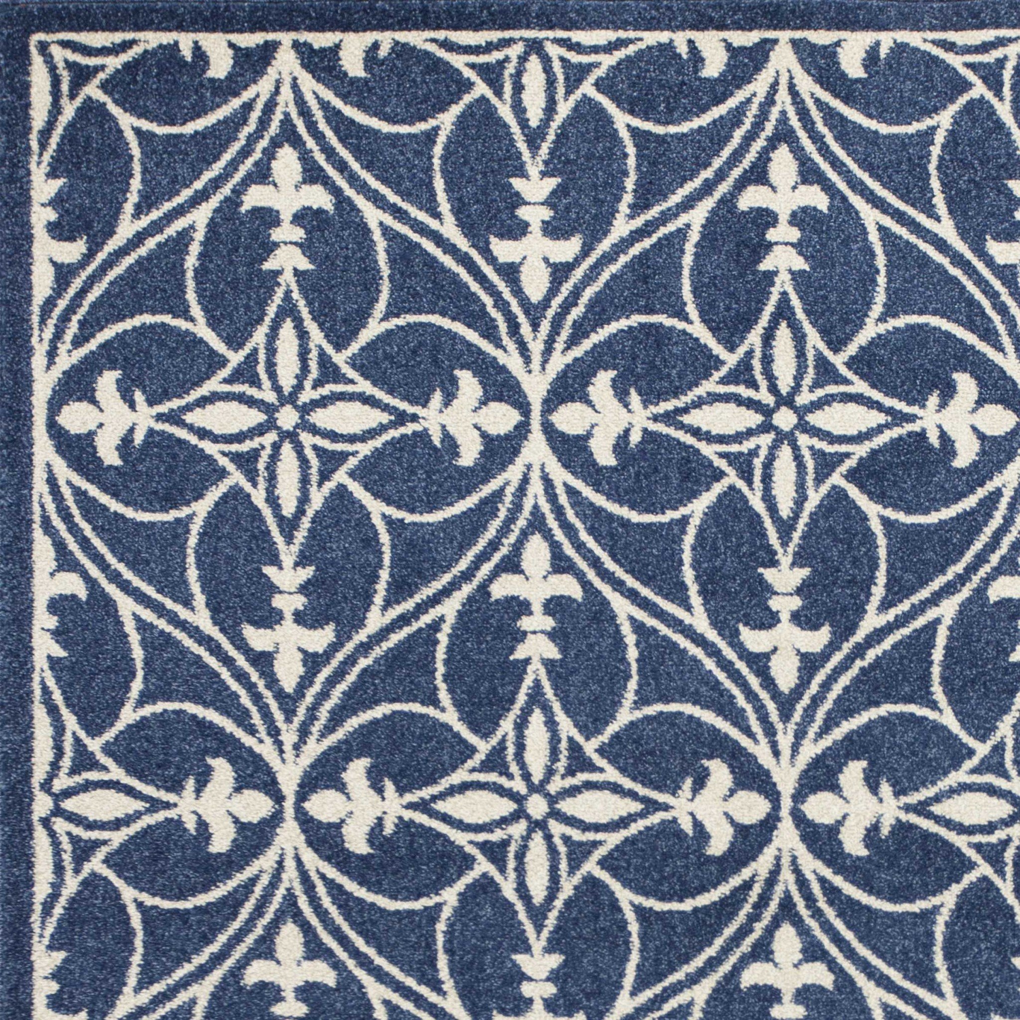 7x9 Denim Vintage Trellis UV Treated Indoor Area Rug showcasing elegant patterns and a modern denim blue color.