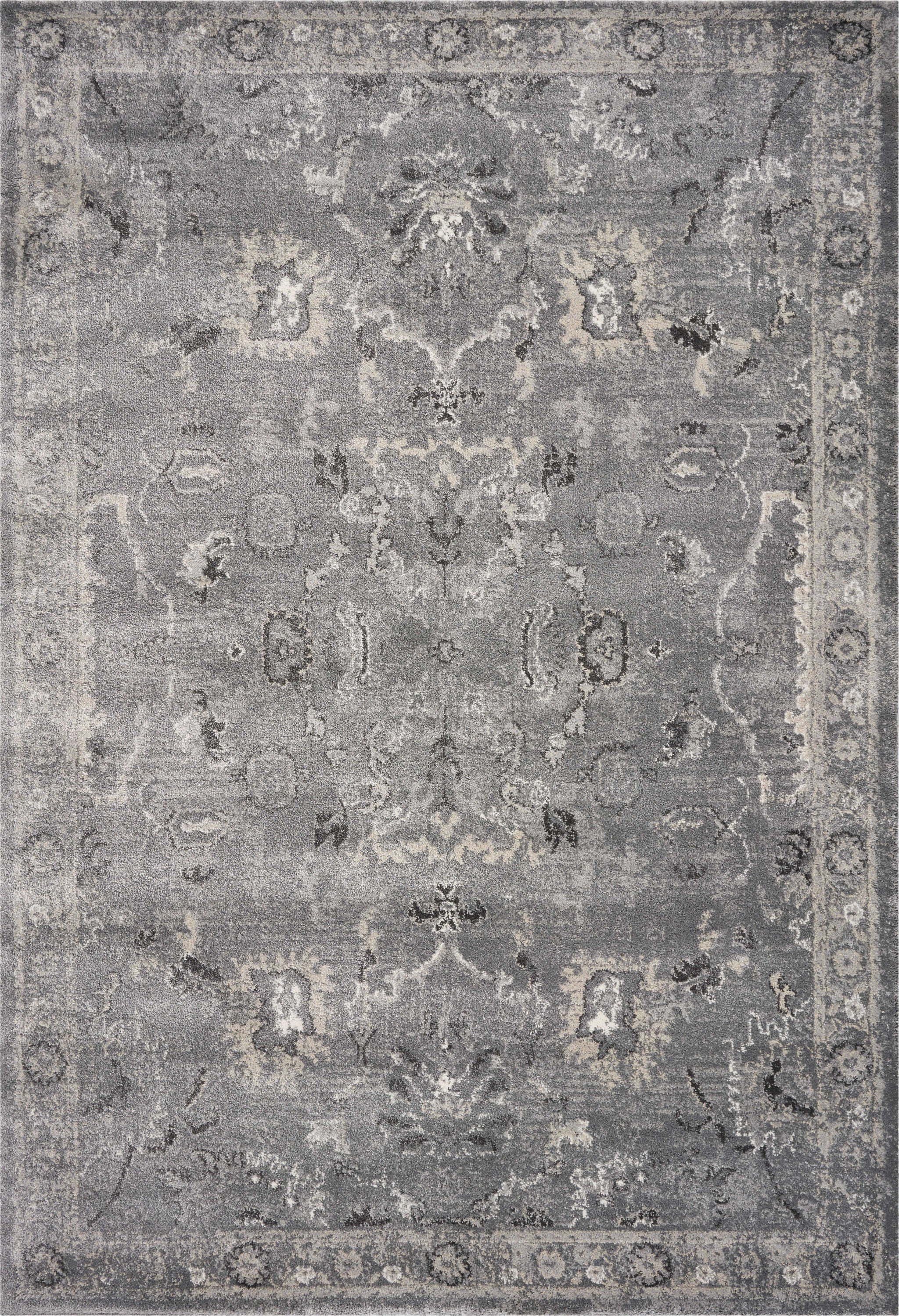 7x9 inches grey polypropylene area rug with a contemporary design, perfect for enhancing living spaces.