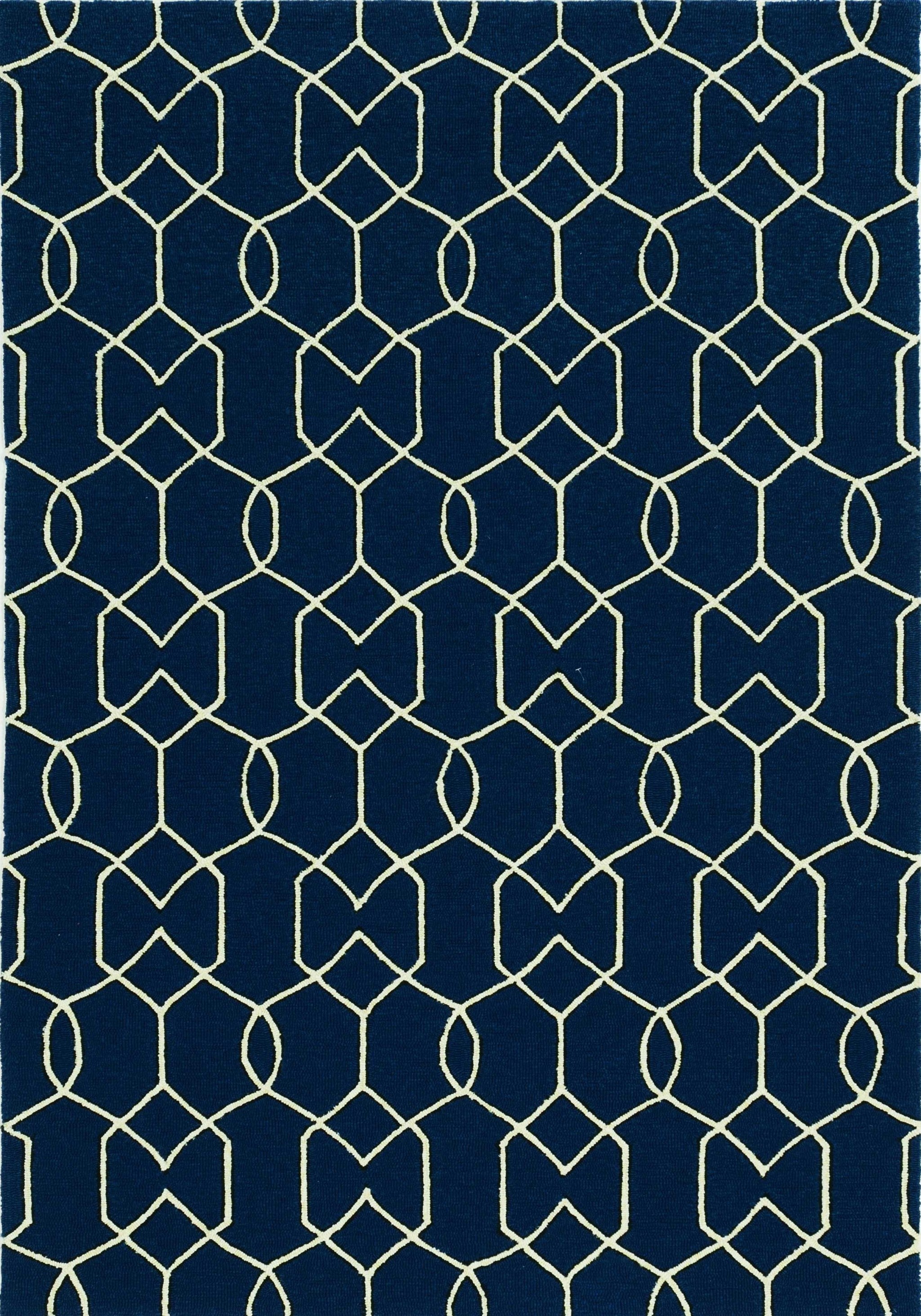 A beautiful navy blue hand-hooked rug featuring a trellis design, perfect for indoor and outdoor use, showcasing intricate patterns.