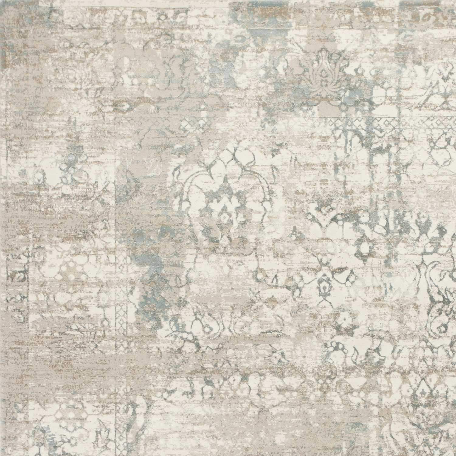 Elegant 8' x 11' ivory polypropylene area rug with a distressed look, perfect for enhancing home decor.