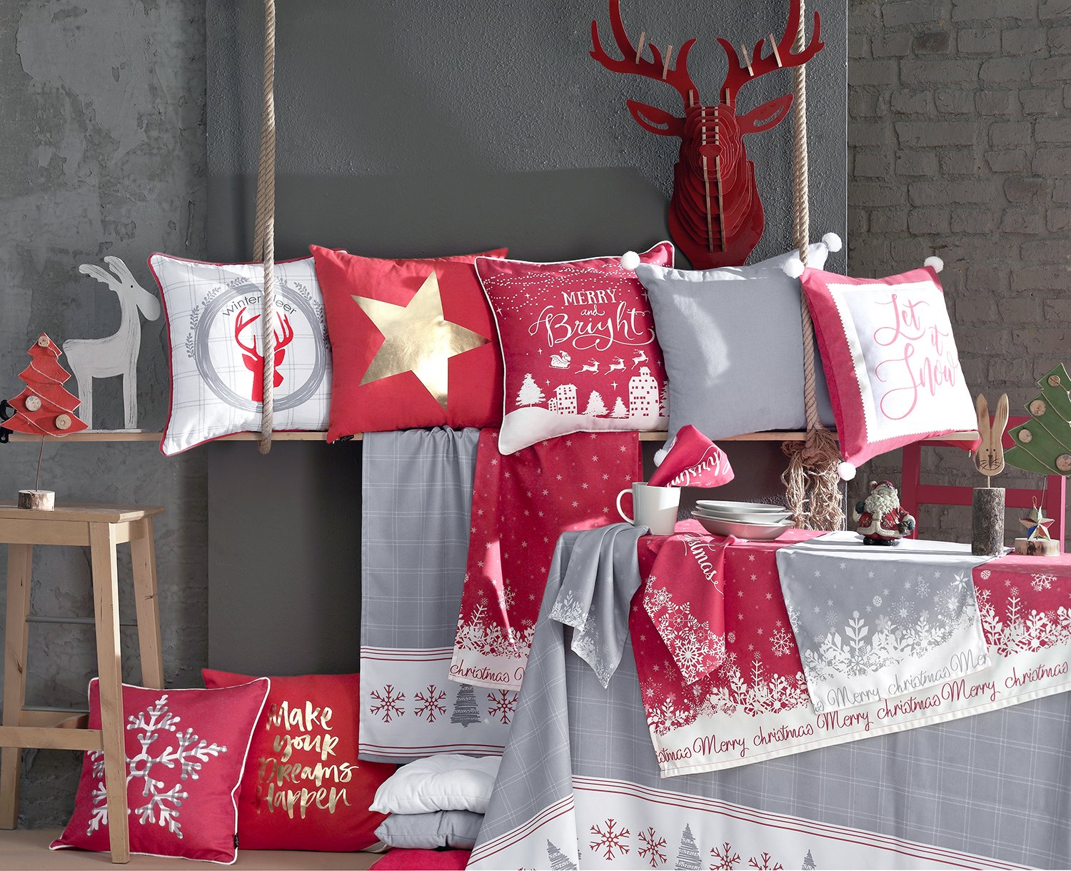 A luxurious red tablecloth with Merry Christmas print, perfect for holiday dining.