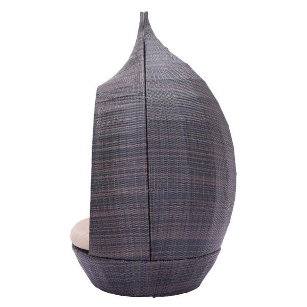 Brown Martinique Day Beach Bed with plush cushions and pillows, perfect for outdoor lounging.