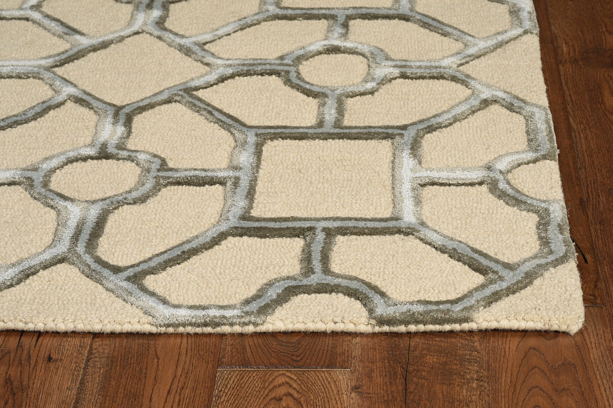 8-inch beige hand tufted geometric indoor runner rug showcasing intricate patterns and textures, perfect for modern home decor.