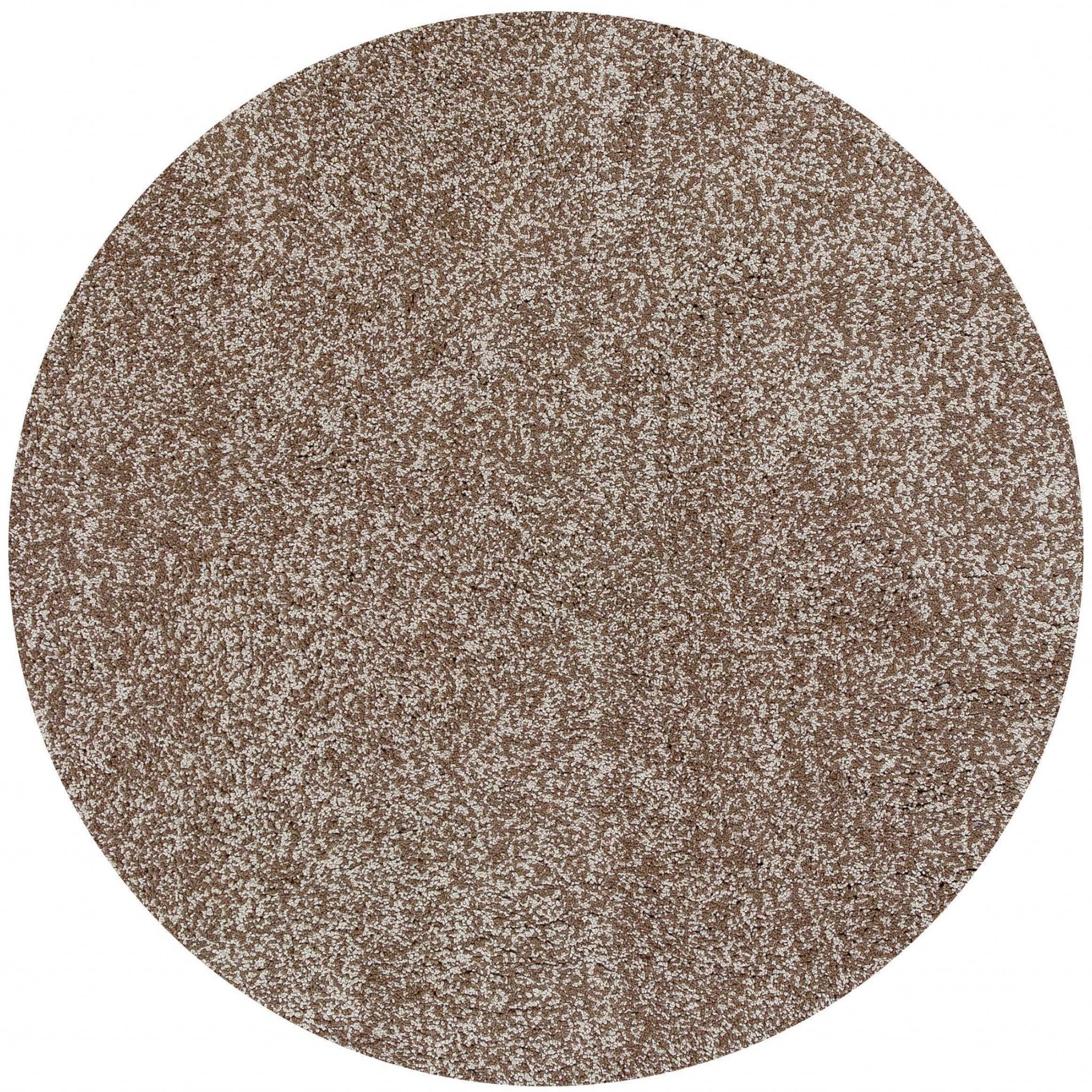 8-inch round indoor shag rug in beige heather color, showcasing a plush texture and modern design, perfect for enhancing home decor.