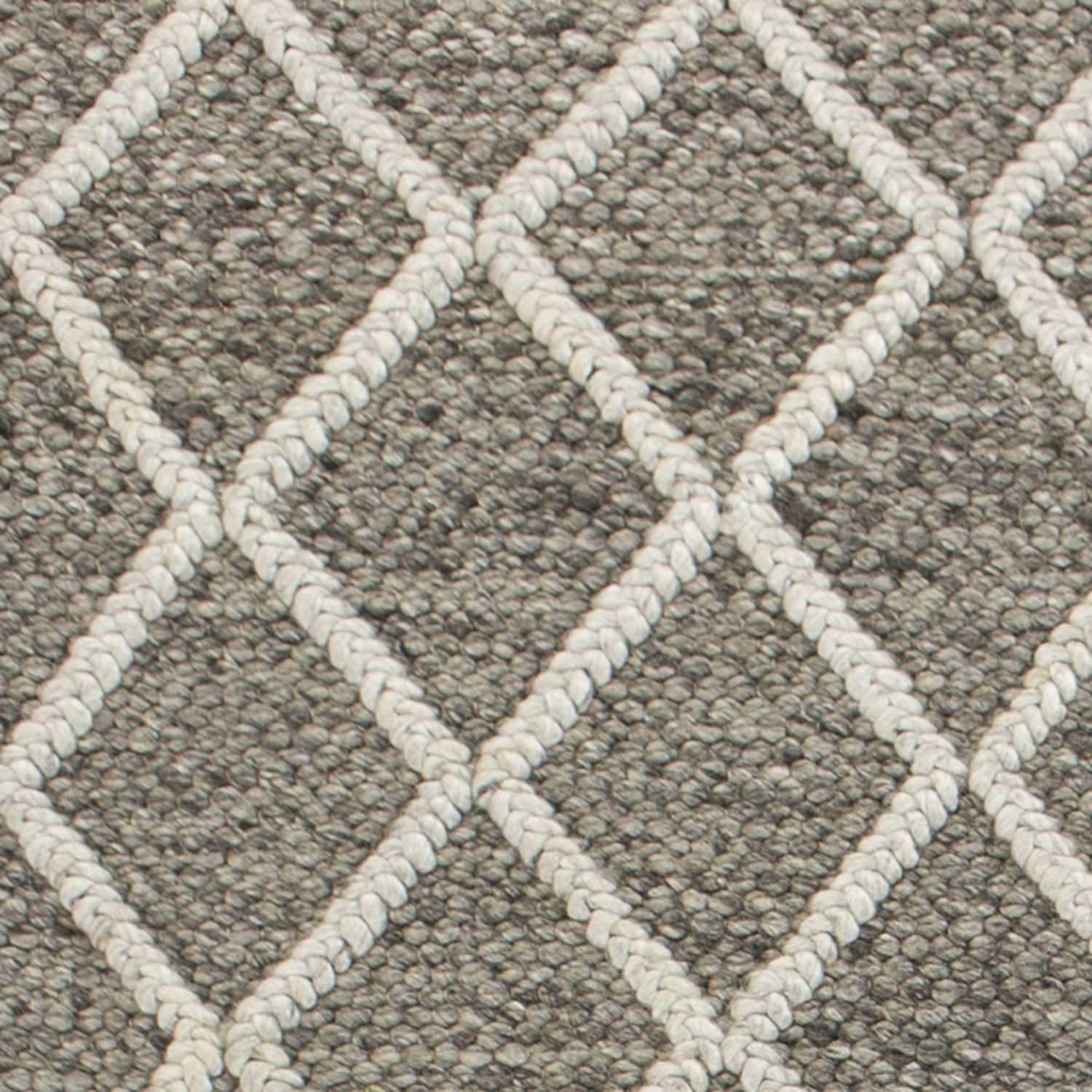 8x10 dark grey hand woven diamond pattern indoor area rug, showcasing a sophisticated design and luxurious texture.