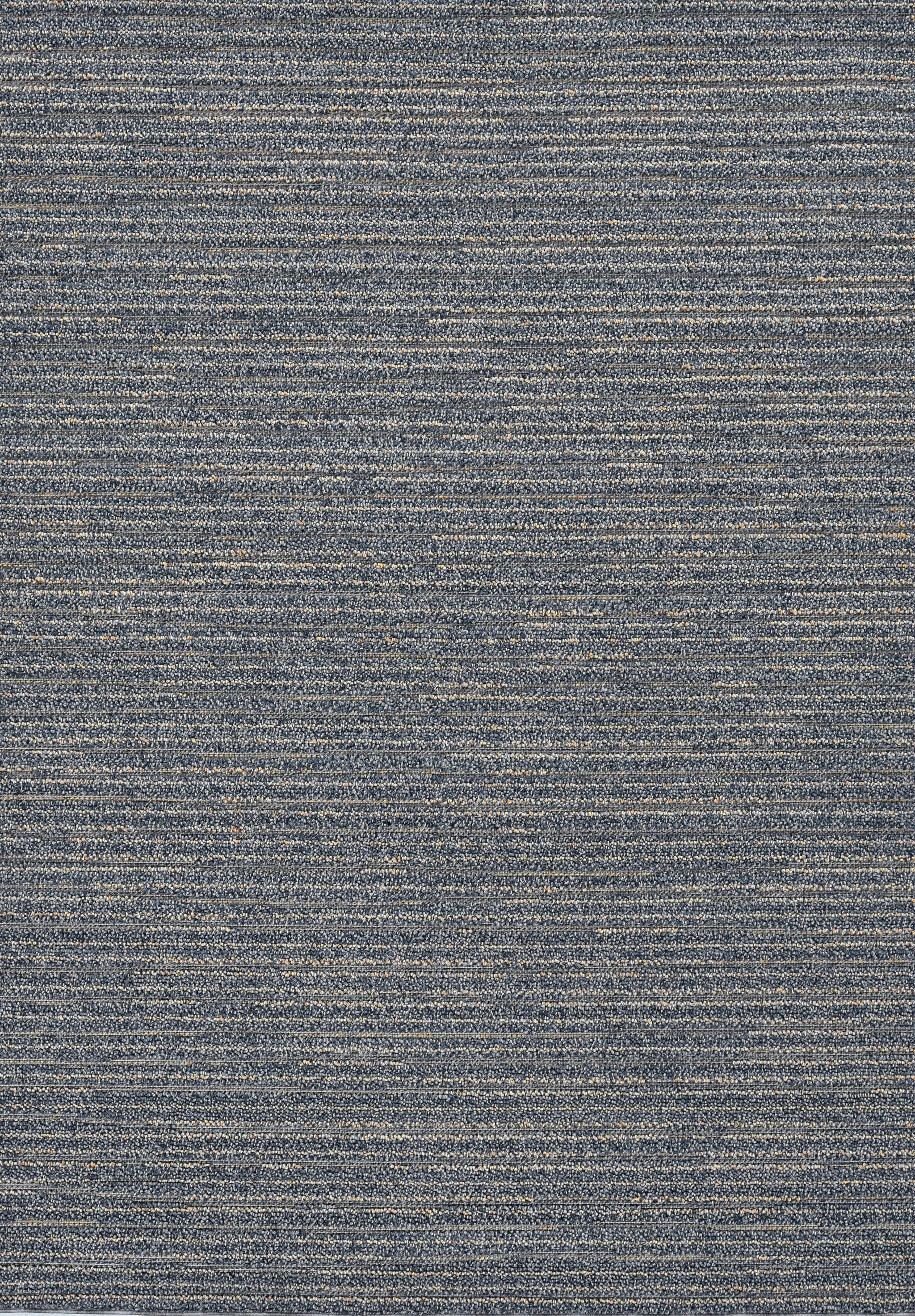 Denim blue machine woven rug, 8x10 inches, suitable for indoor and outdoor use, showcasing a low pile height and UV-treated material.