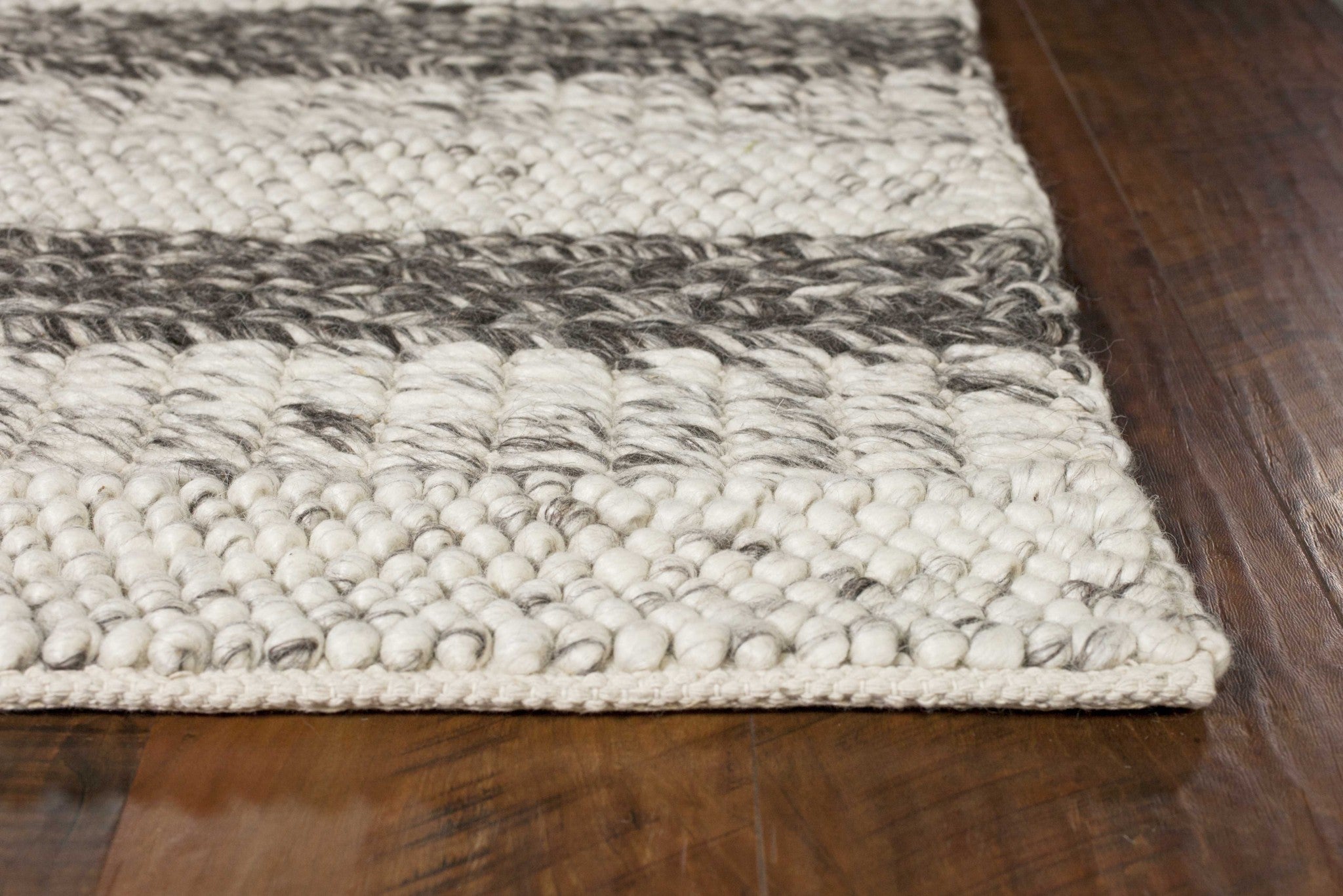 8x10 grey and white hand woven knobby stripes indoor area rug showcasing modern design and soft texture.