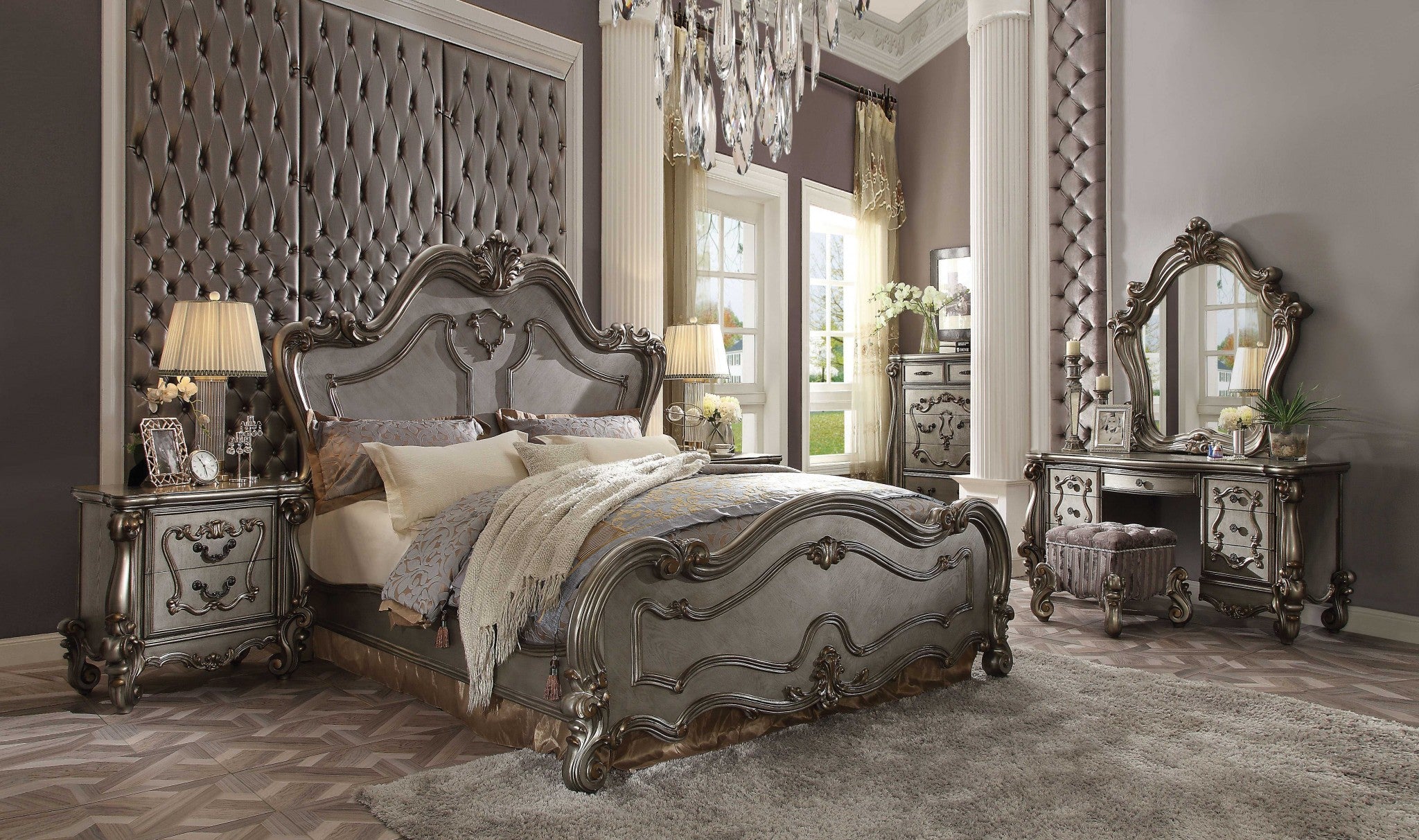 Antique Platinum Wood Poly Resin bedroom set featuring carved scrollwork and elegant design, perfect for a luxurious bedroom.