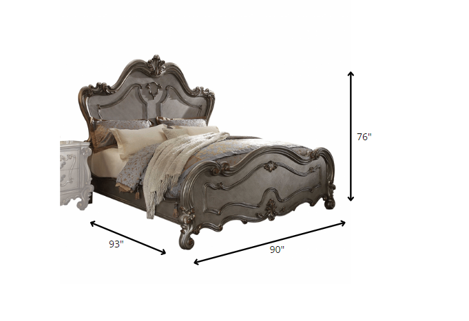 Antique Platinum Wood Poly Resin bedroom set featuring carved scrollwork and elegant design, perfect for a luxurious bedroom.