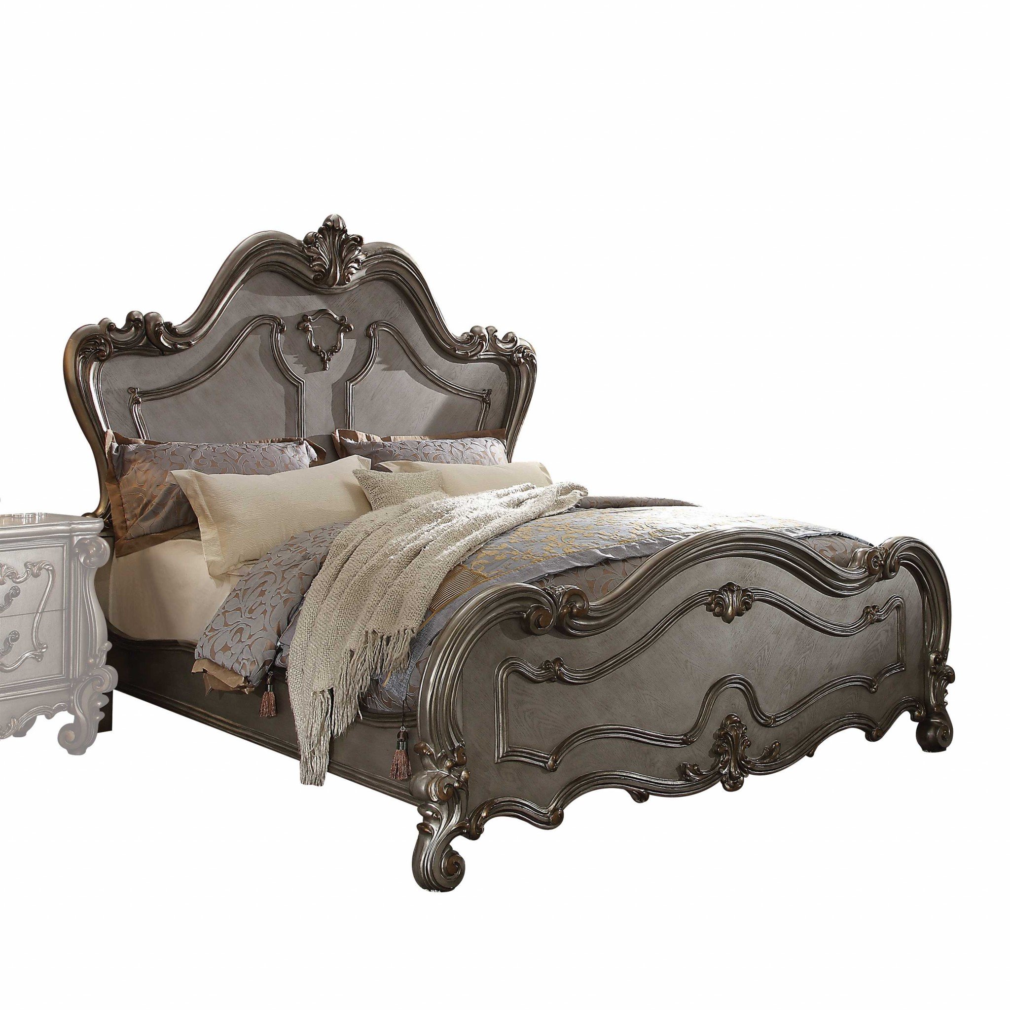 Antique Platinum Wood Poly Resin bedroom set featuring carved scrollwork and elegant design, perfect for a luxurious bedroom.