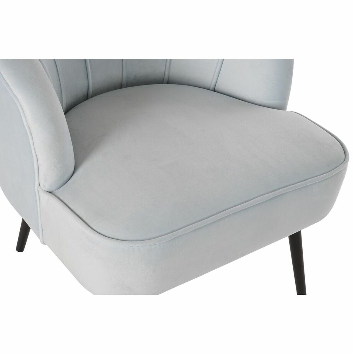 Light grey upholstered armchair seat.