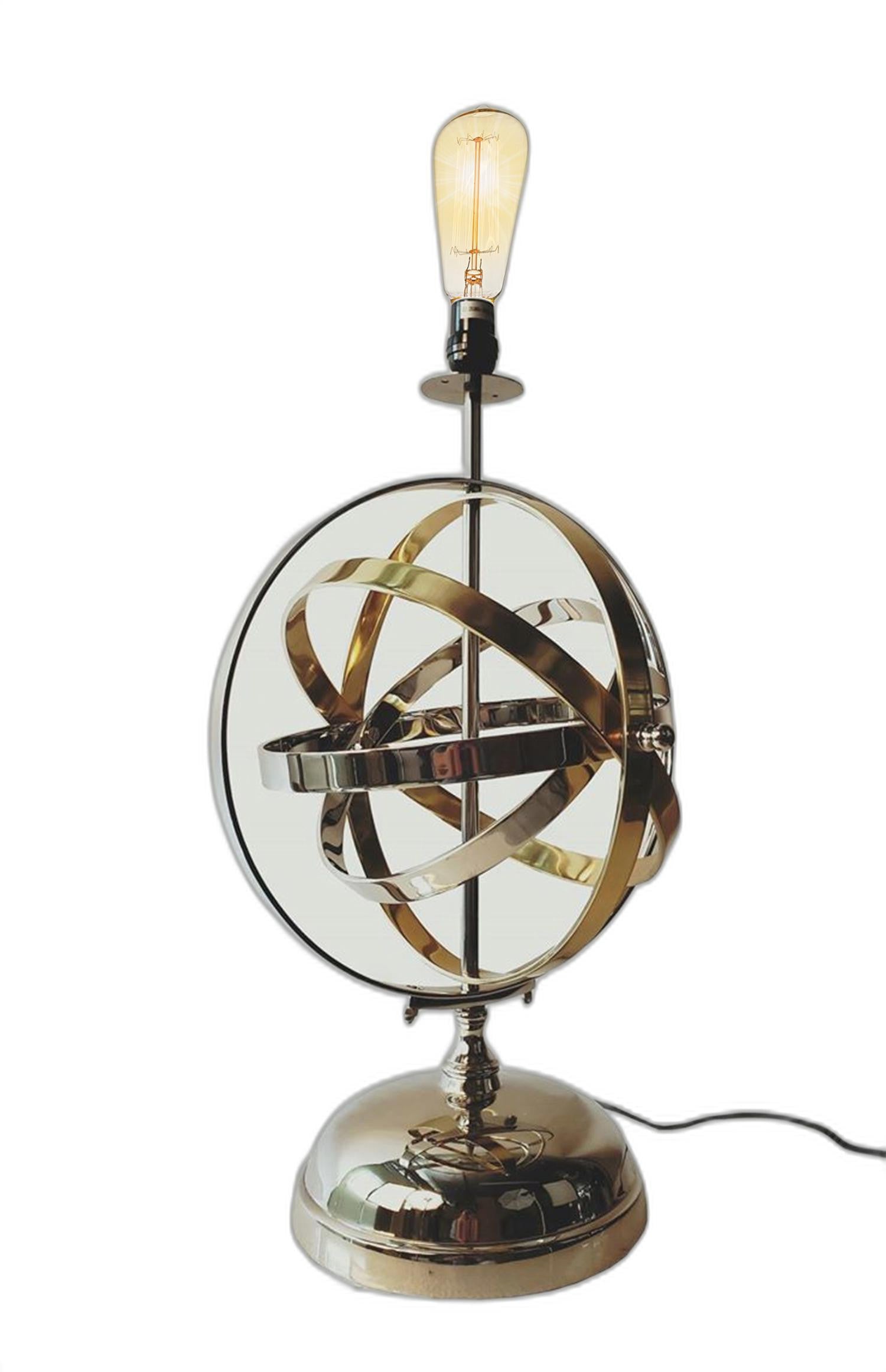 Armillary Sphere Aluminum Table Lamp featuring rotating silver and gold rings, elegant design, and a glossy finish.
