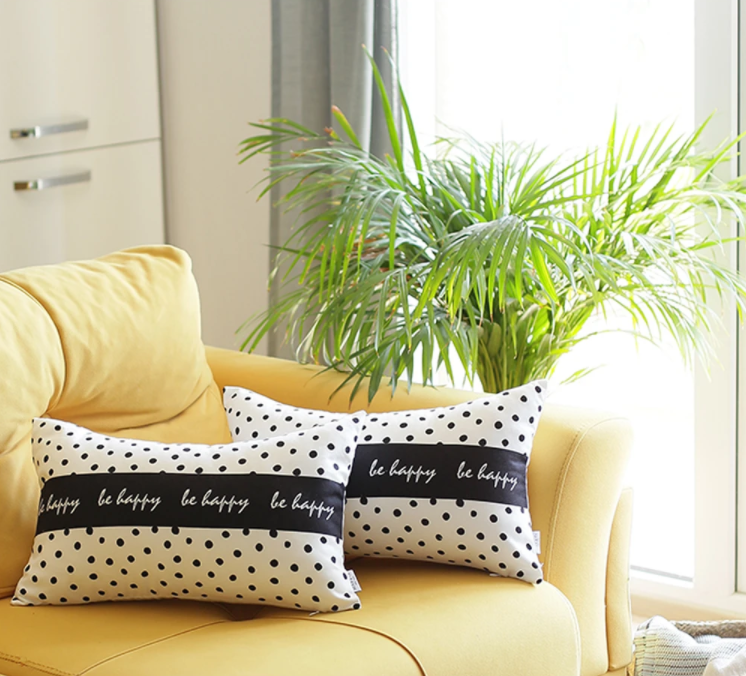Be Happy Dots Decorative Rectangle Throw Pillow Cover featuring black polka dots on white with a hidden zipper closure.