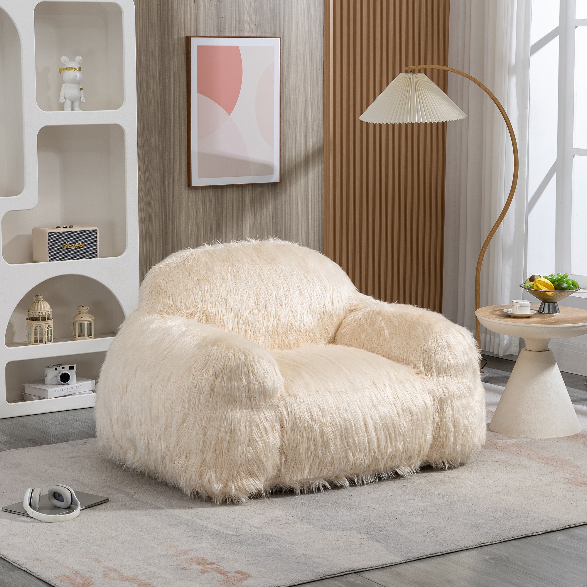 A stylish beige bean bag chair made of faux fur, designed for comfort and relaxation, suitable for adults and teens.