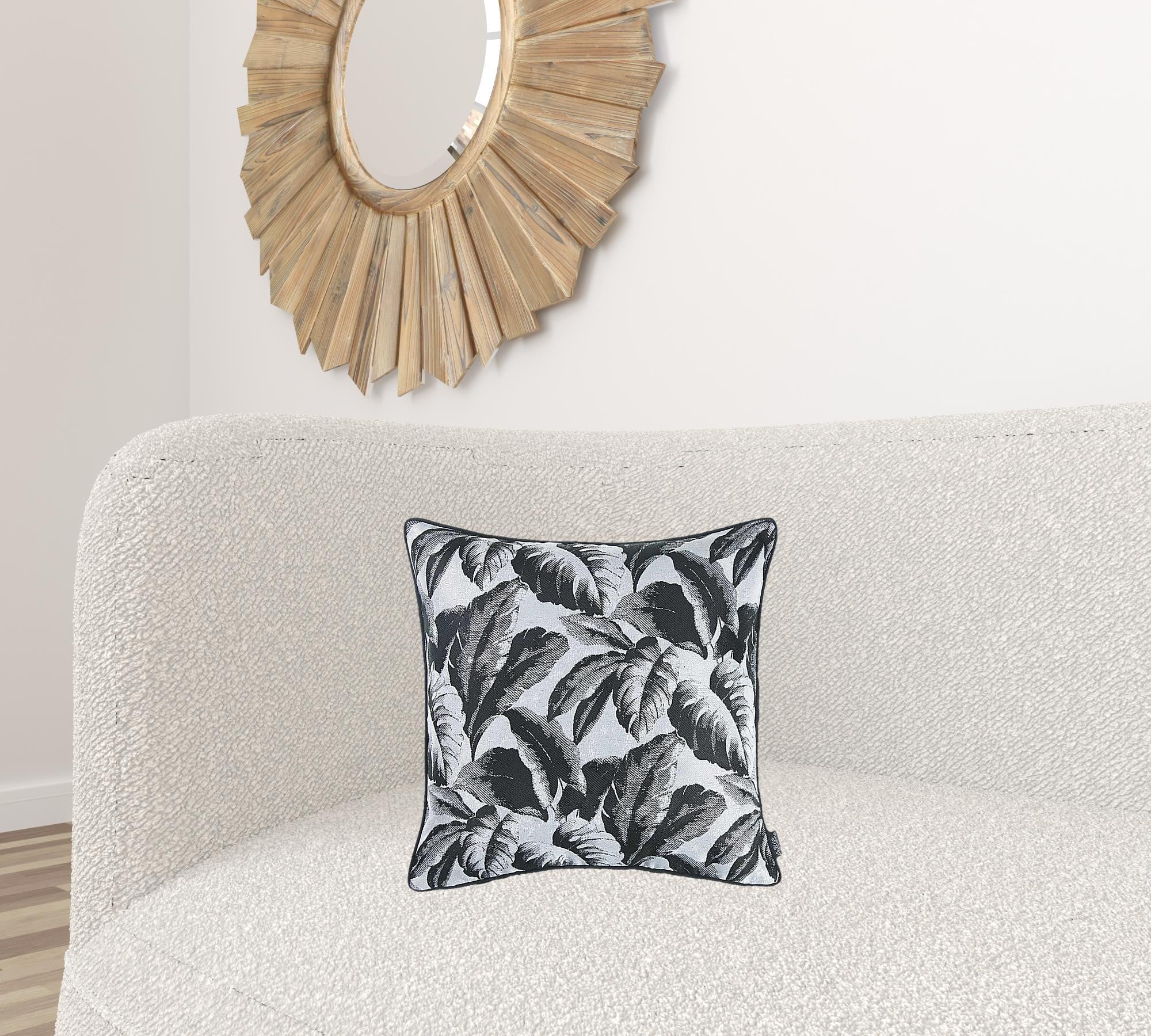 Black and white decorative throw pillow cover featuring a tropical leaf design, made from soft jacquard fabric with a hidden zipper closure.