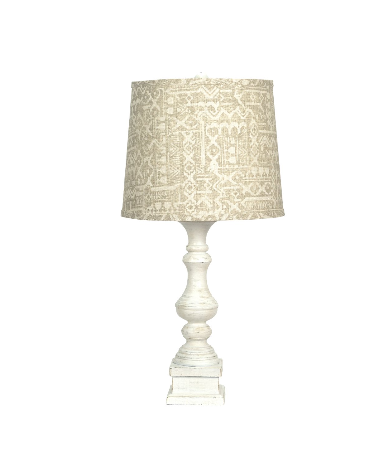 Distressed Whitewash Beige Batik Shade Table Lamp showcasing its elegant design and soothing light.