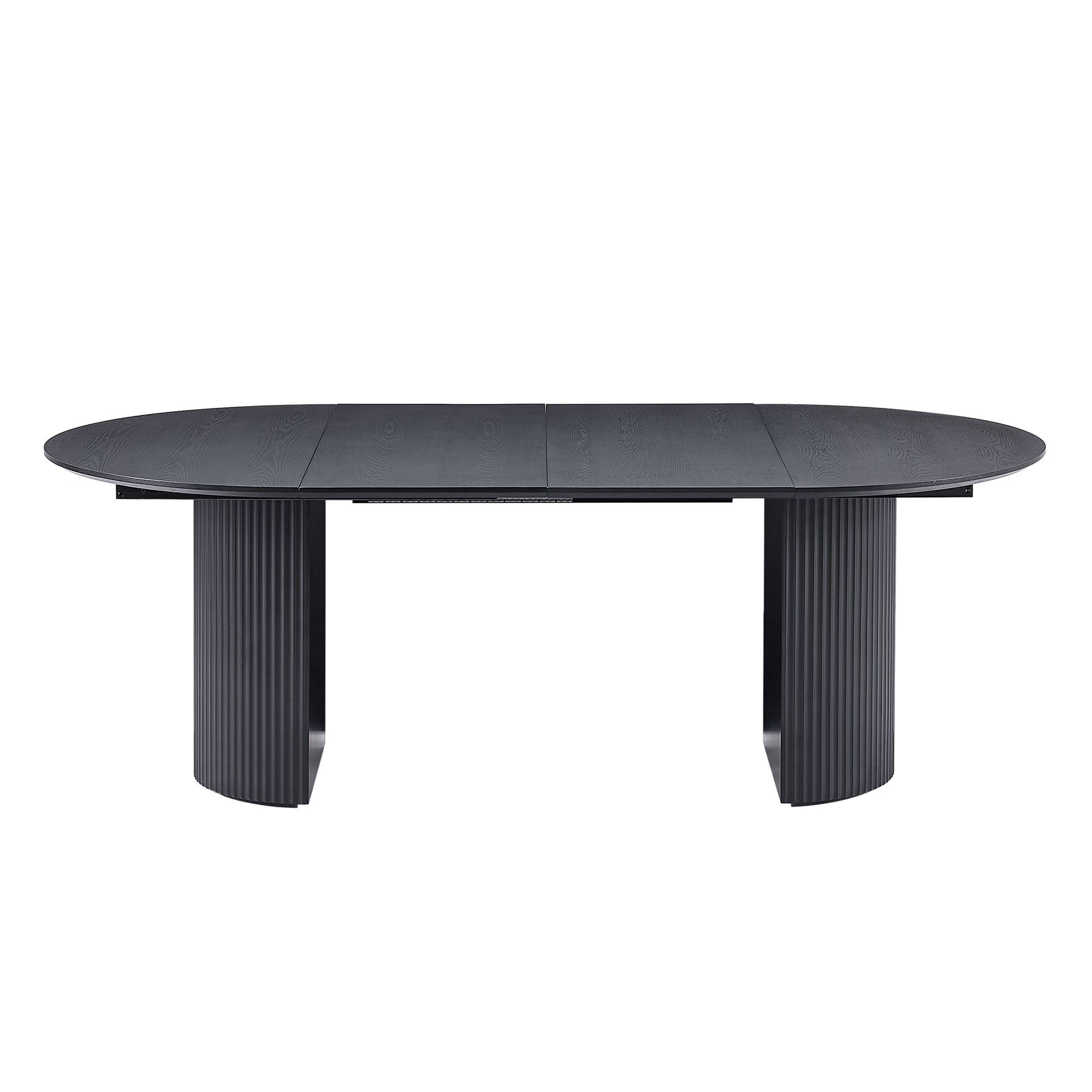 Expandable dining table with a solid black top, designed to extend for additional seating, showcasing a modern and elegant style.