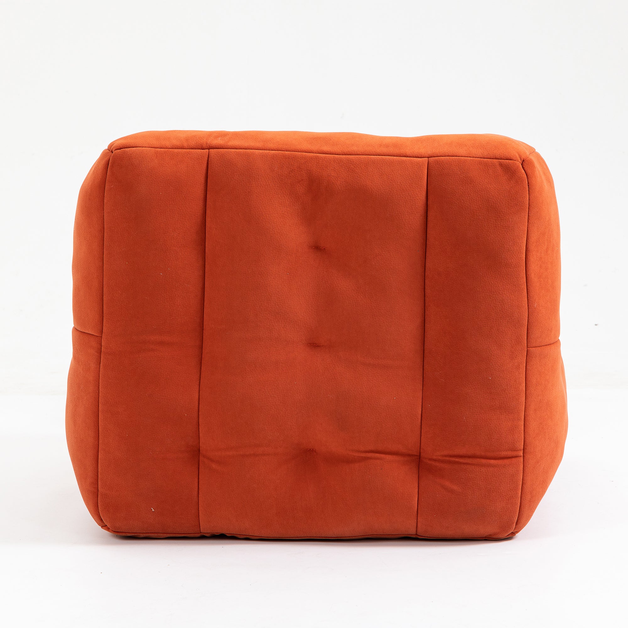 Fluffy bean bag chair in vibrant red velvet, designed for comfort and support for both adults and children.