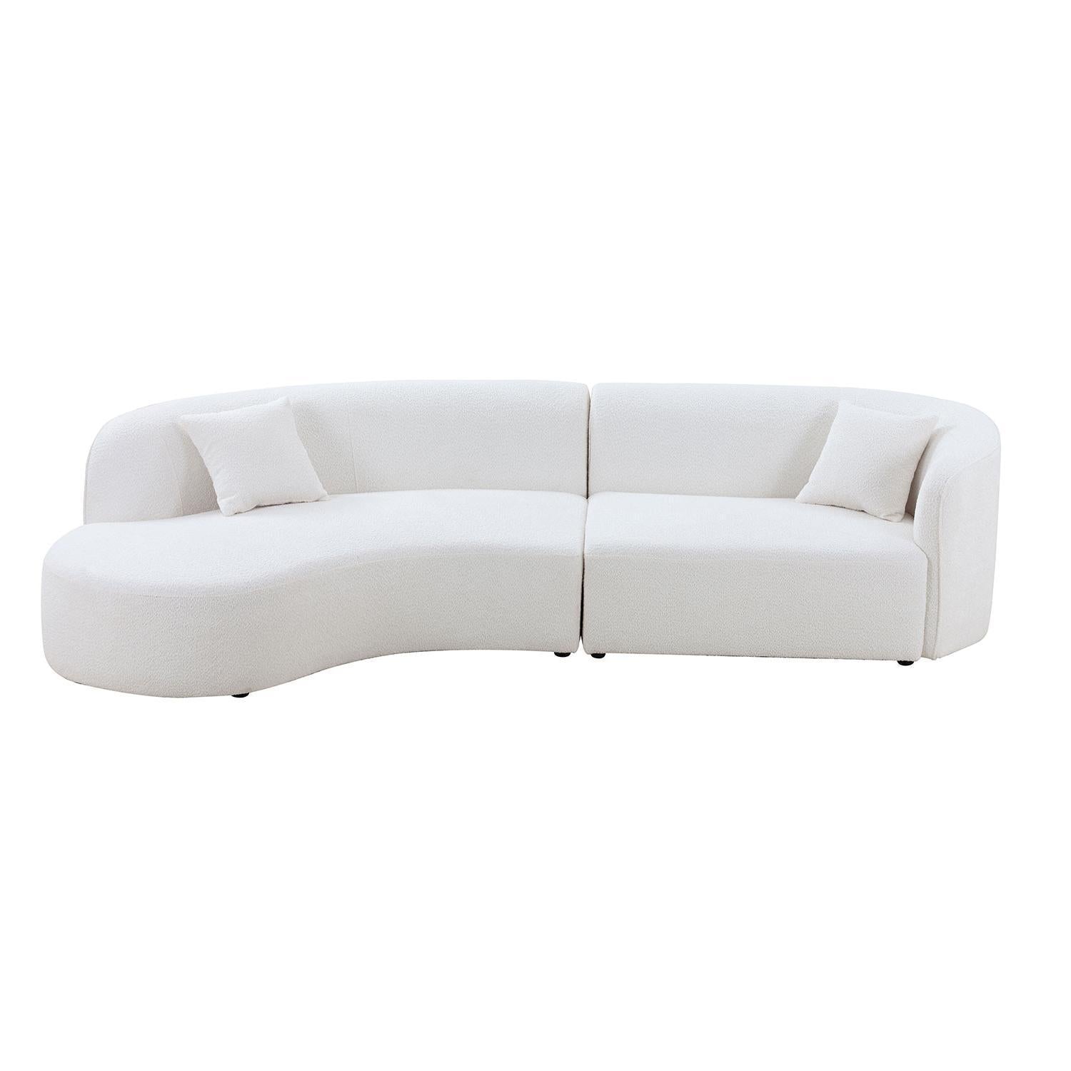 Luxury modern curved sofa with chaise in beige boucle upholstery, featuring a sleek design and plush cushions, perfect for stylish living rooms.