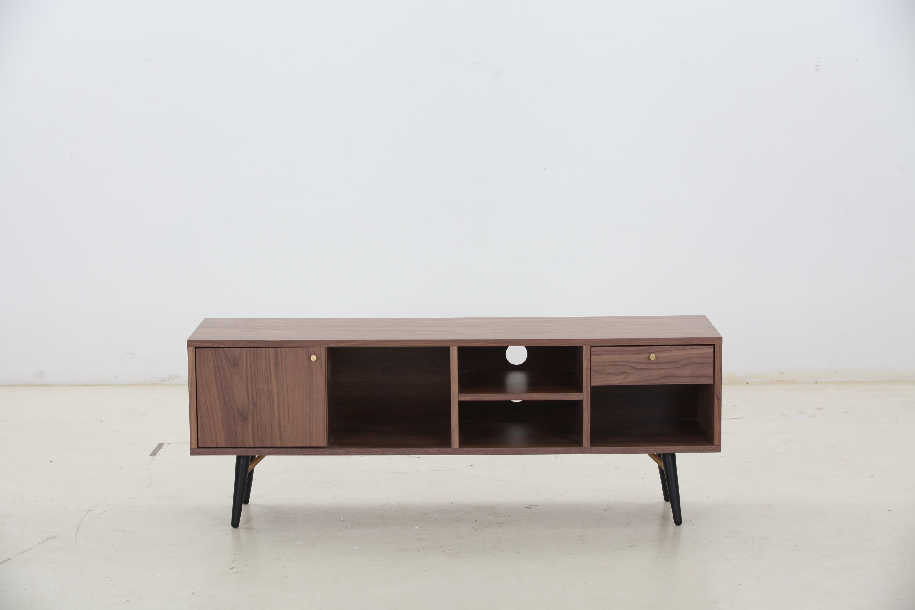 Mid-Century Modern Low Profile Media Console TV Stand in Walnut, featuring a sleek design with open and concealed shelving for storage.