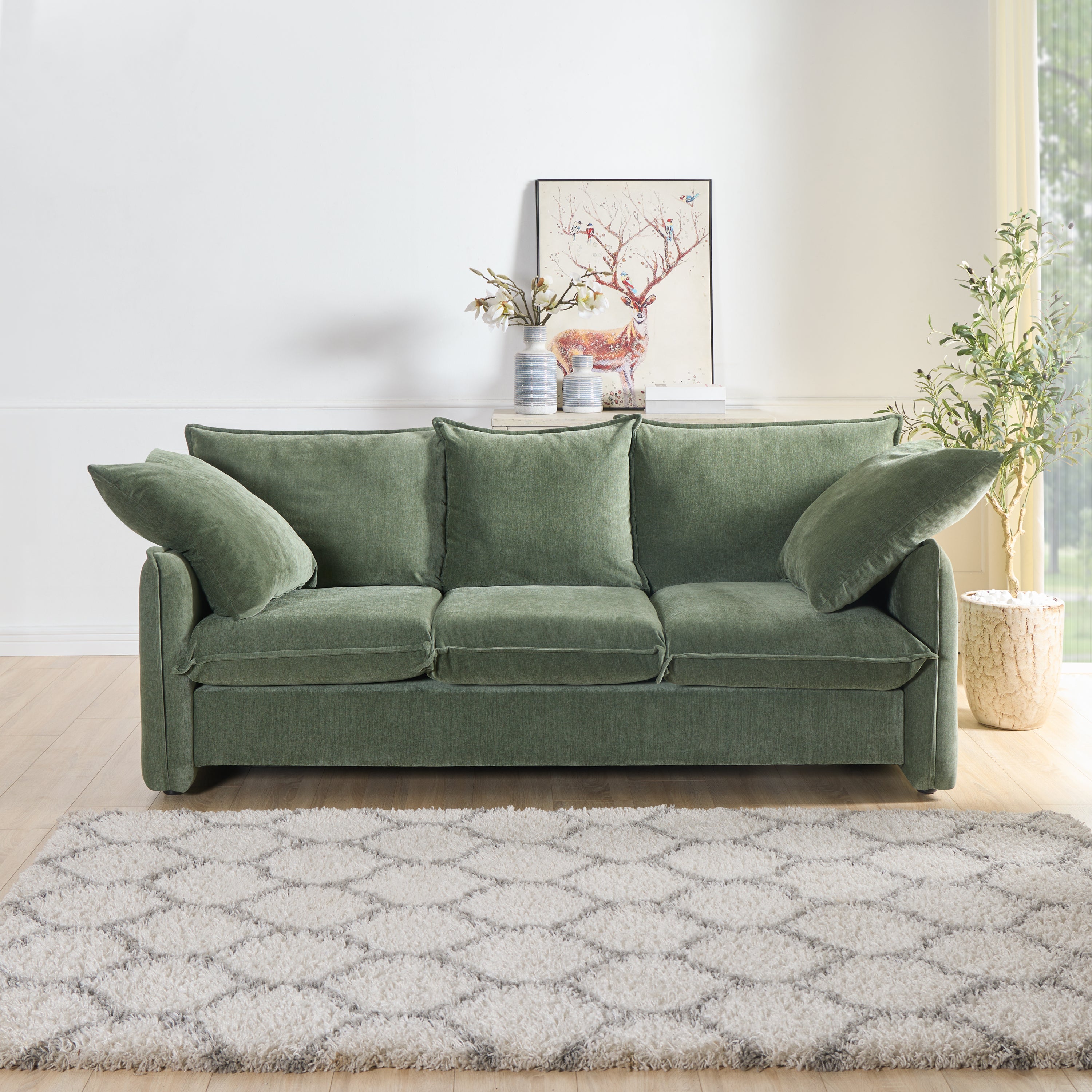 Mid-century 3-seater sofa in green upholstery with stylish stitching, perfect for living rooms and lounges.