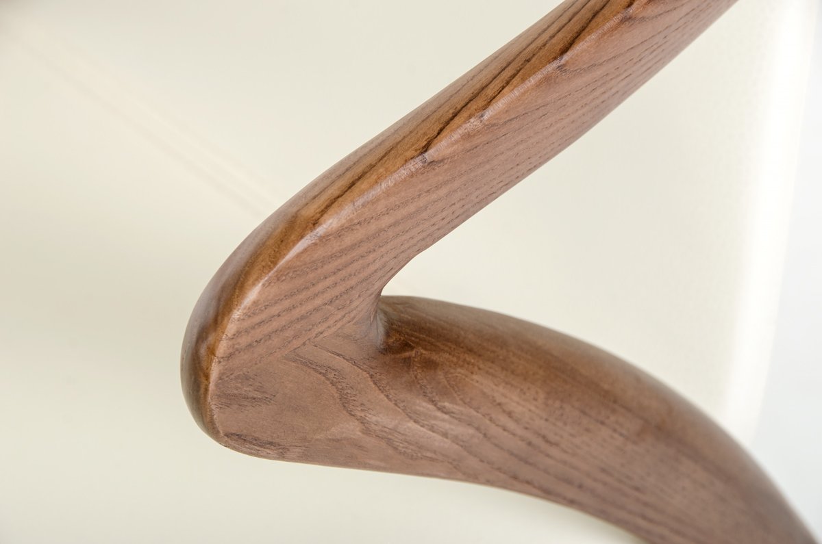 Mod Walnut Wood and Cream Faux Dining Chair showcasing elegant walnut legs and soft cream upholstery, perfect for dining spaces.