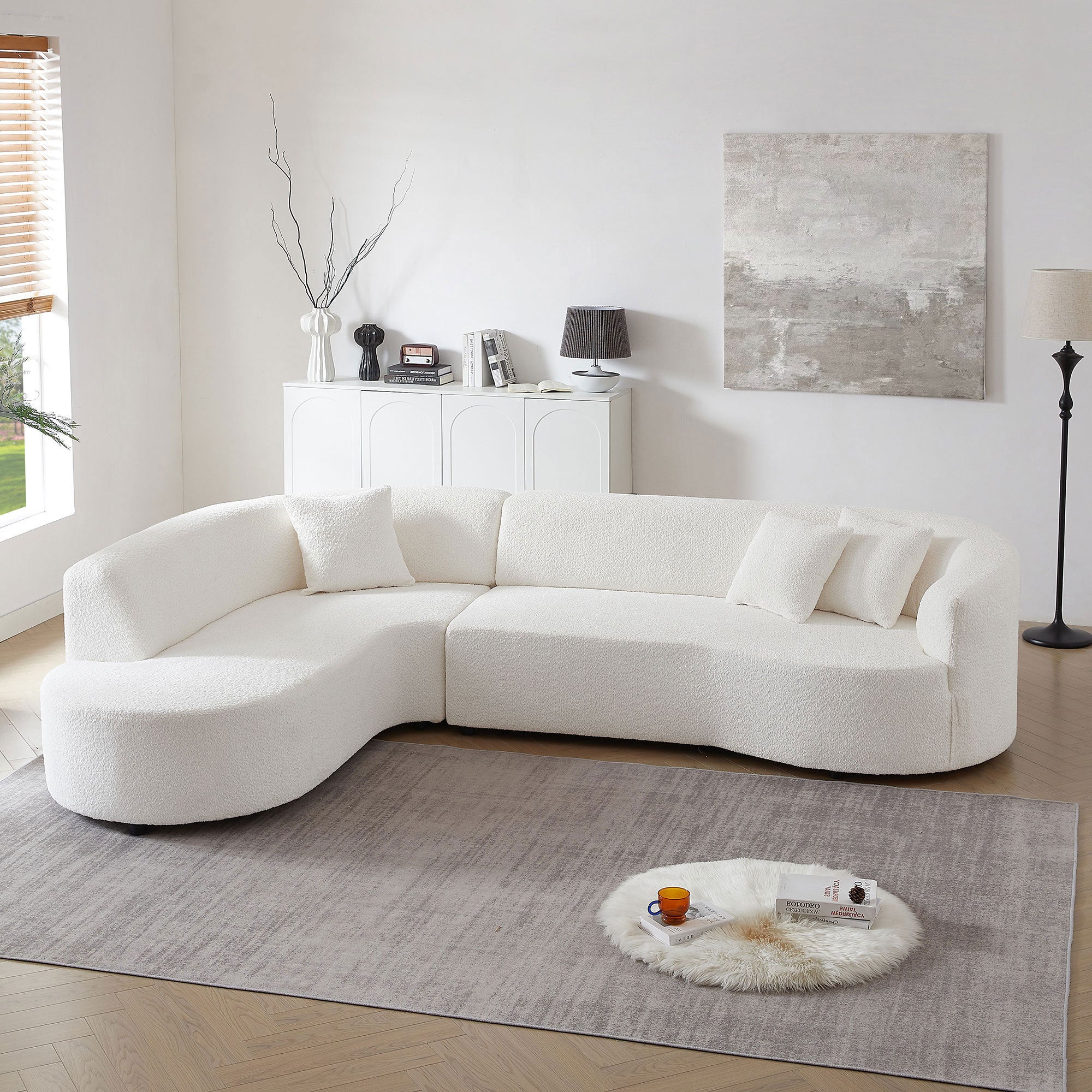 Modular Sectional Sofa with Left Chaises in white boucle fabric, featuring a modern design and plush throw pillows.
