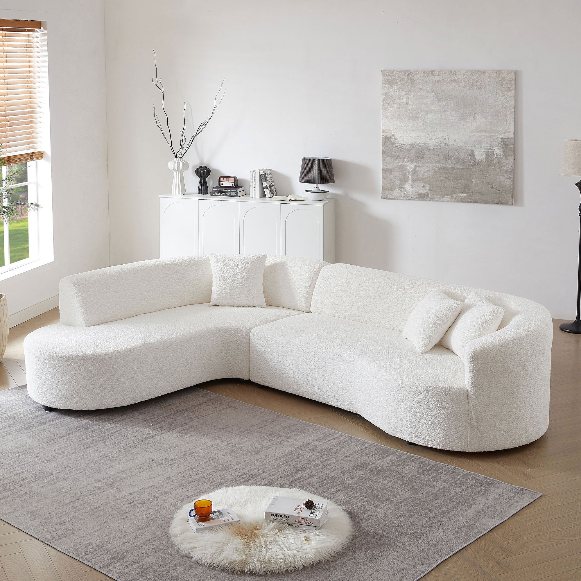 Modular Sectional Sofa with Left Chaises in white boucle fabric, featuring a modern design and plush throw pillows.