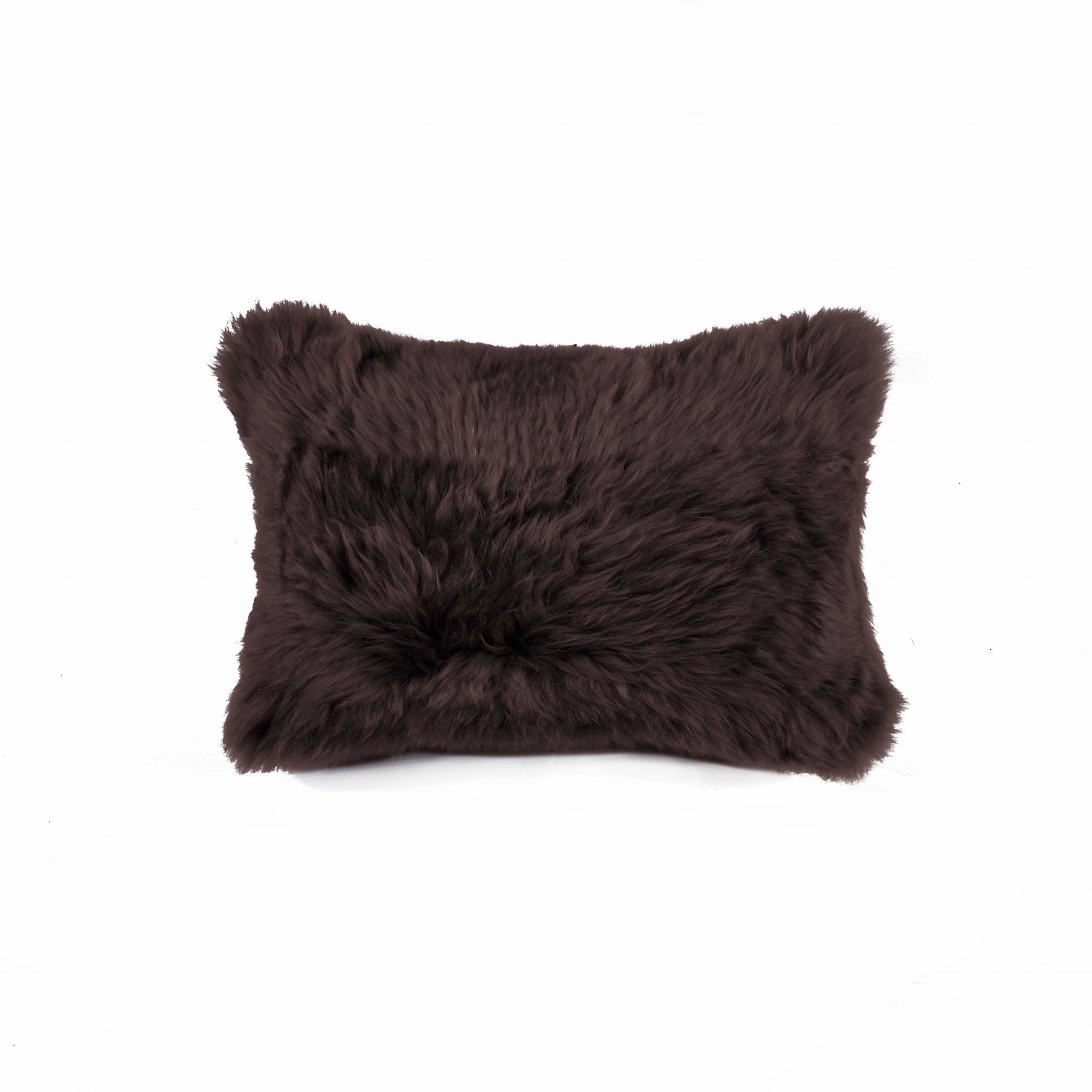 Rectangular Soft Chocolate Natural Sheepskin Fur Lumbar Pillow with soft microsuede backing, showcasing its lush texture and elegant design.