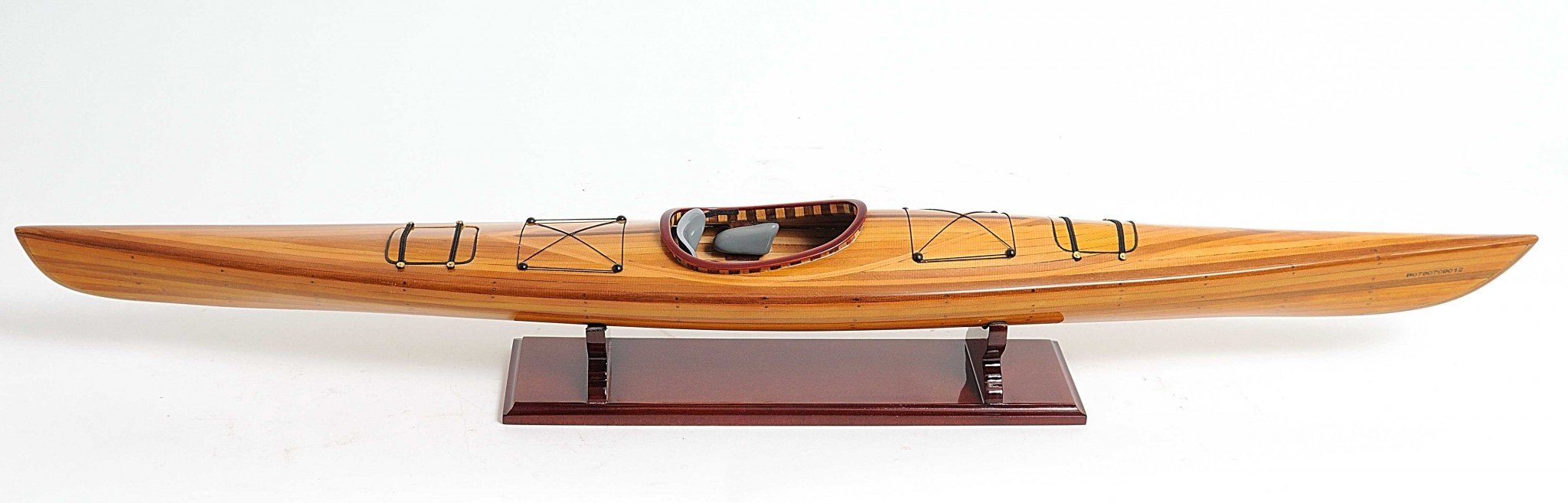 Rich Cedar Kayak Model Sculpture showcasing intricate details and craftsmanship, perfect for display.