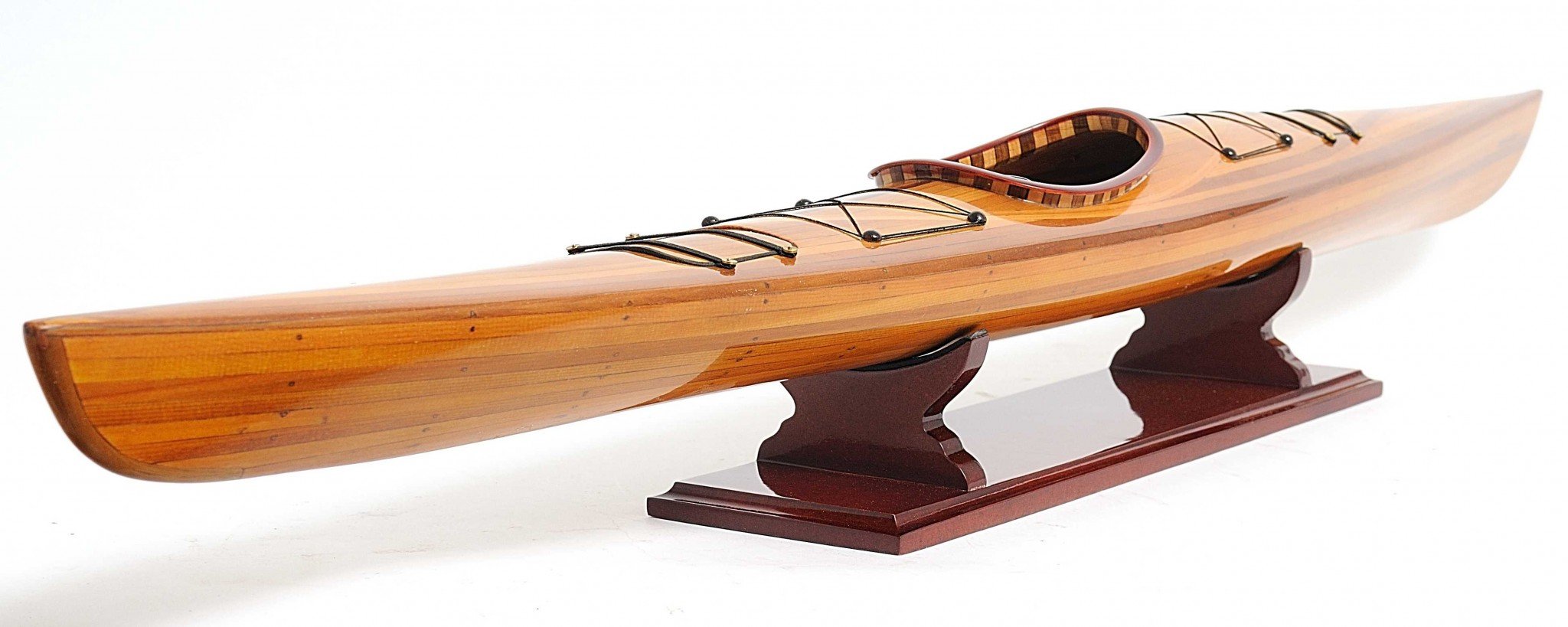 Rich Cedar Kayak Model Sculpture showcasing intricate details and craftsmanship, perfect for display.