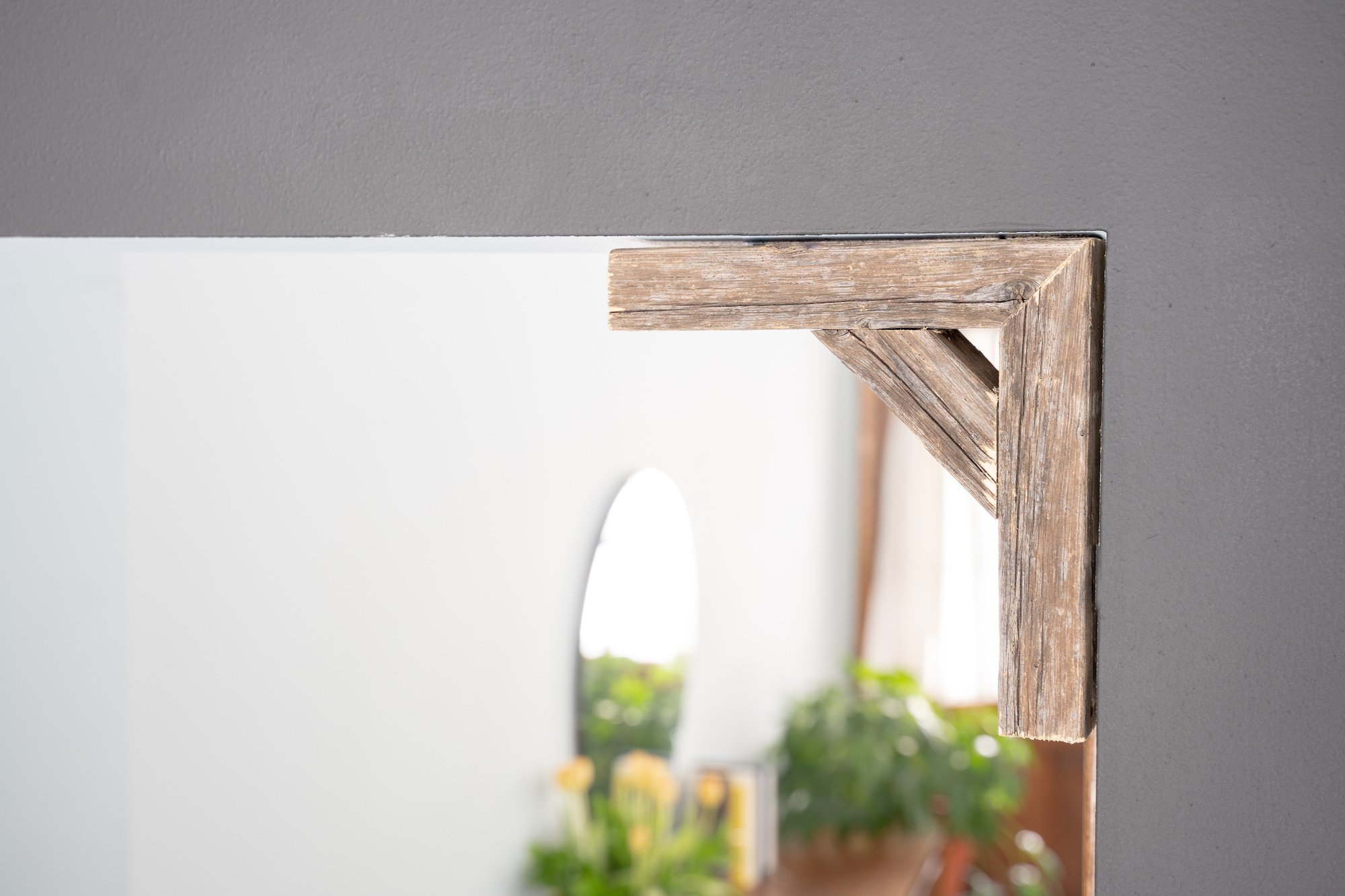 Set of two natural weathered gray corbels made from reclaimed wood, showcasing rustic charm and quality craftsmanship.