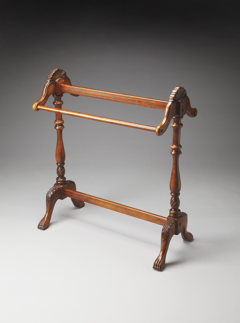 Solid wooden hand carved blanket stand with vintage oak finish, featuring horizontal rails for hanging quilts and comforters.