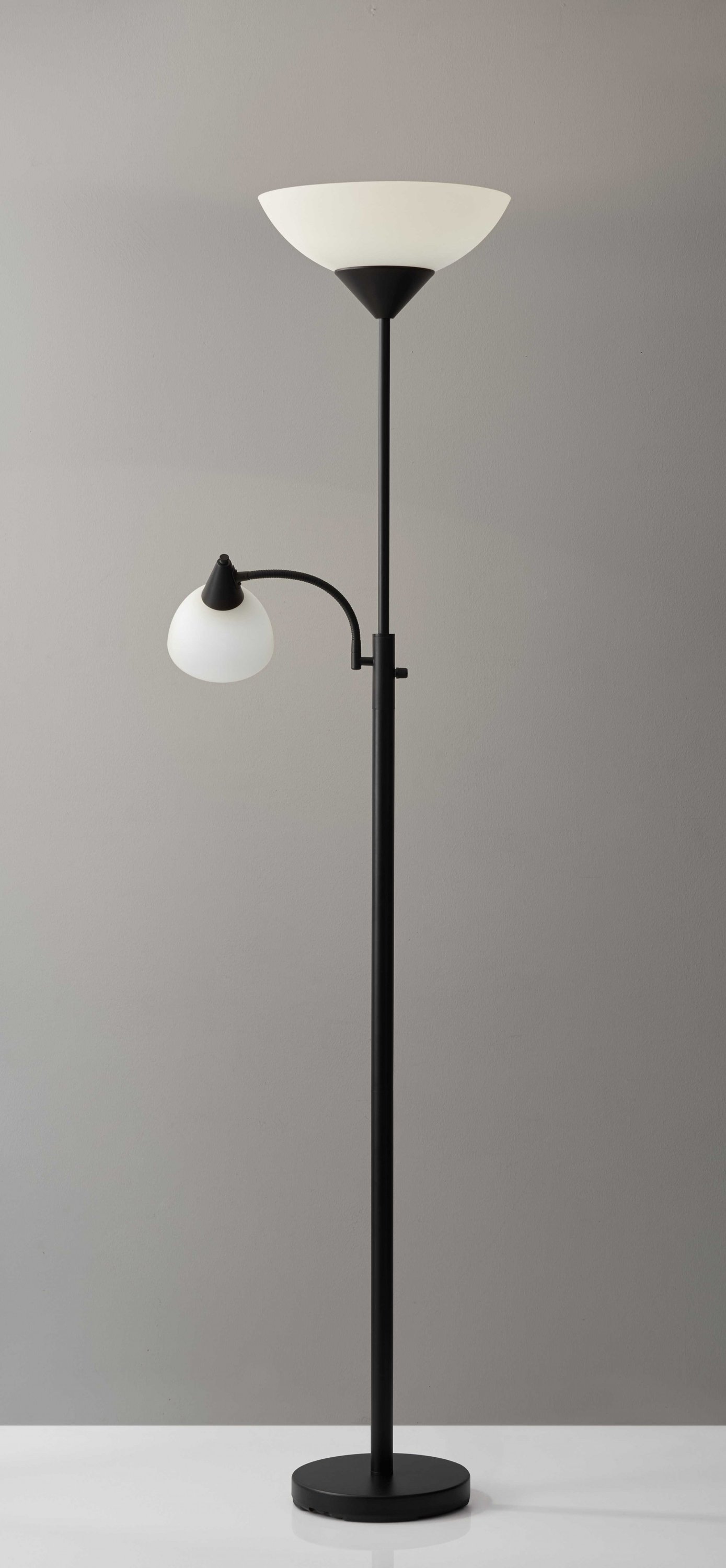 Torchiere Plus Chairside Floor Lamp featuring a black metal body and adjustable gooseneck reading light with white acrylic shades.