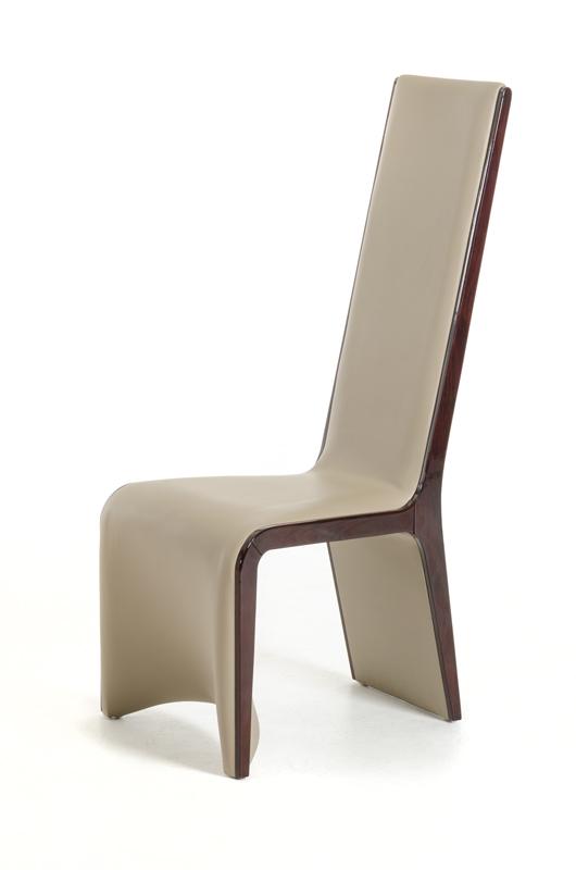Two elegant dining chairs featuring ebony wood legs and taupe leatherette upholstery, showcasing a modern design suitable for any dining space.