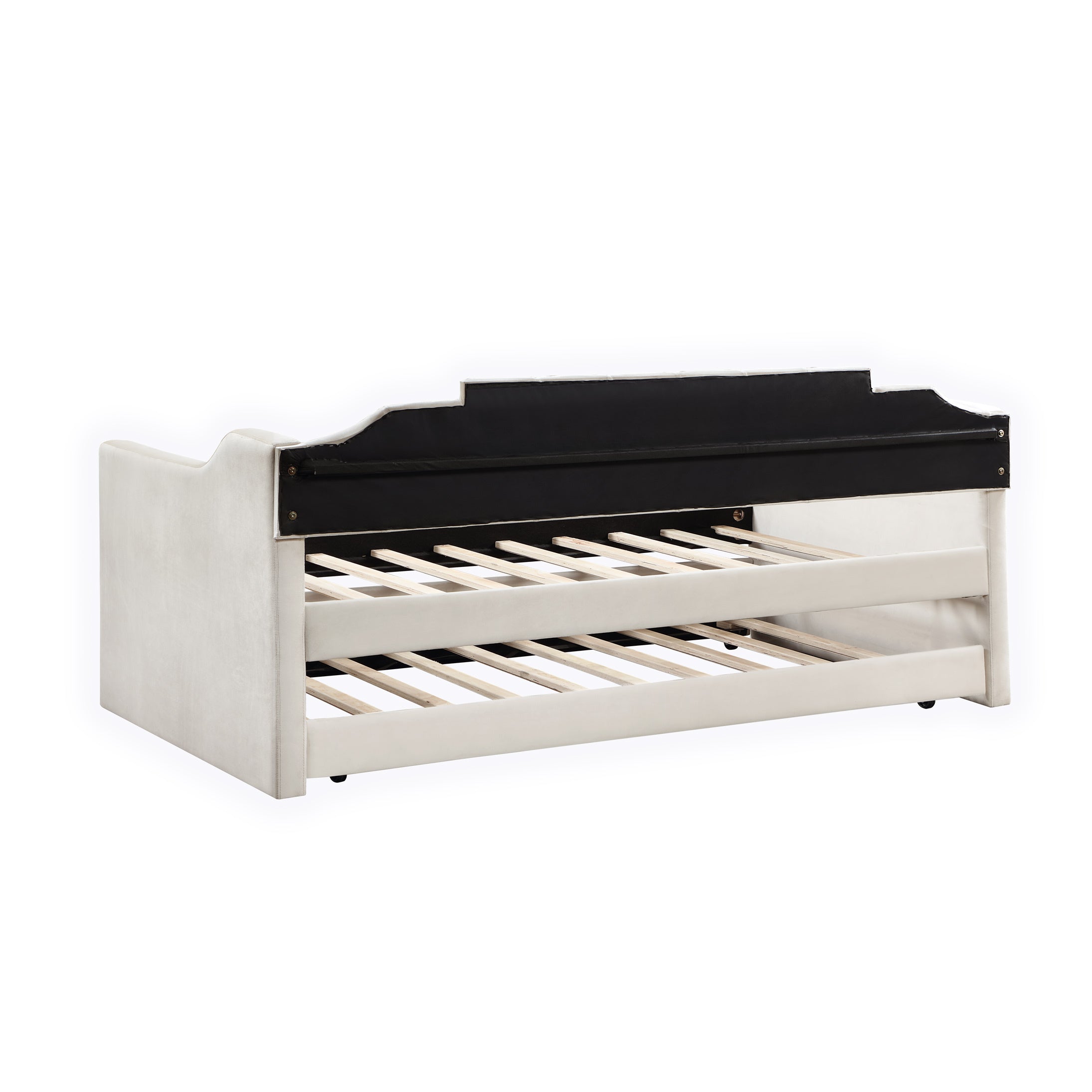 Velvet daybed with trundle in beige upholstery, featuring tufted design and solid wood frame, perfect for small spaces.