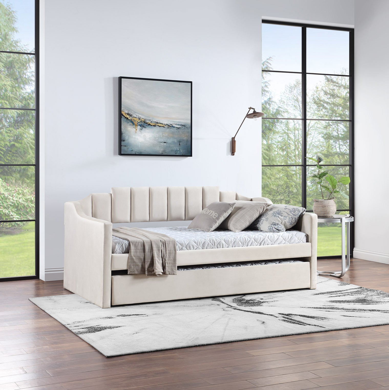 Velvet daybed with trundle in beige upholstery, featuring tufted design and solid wood frame, perfect for small spaces.
