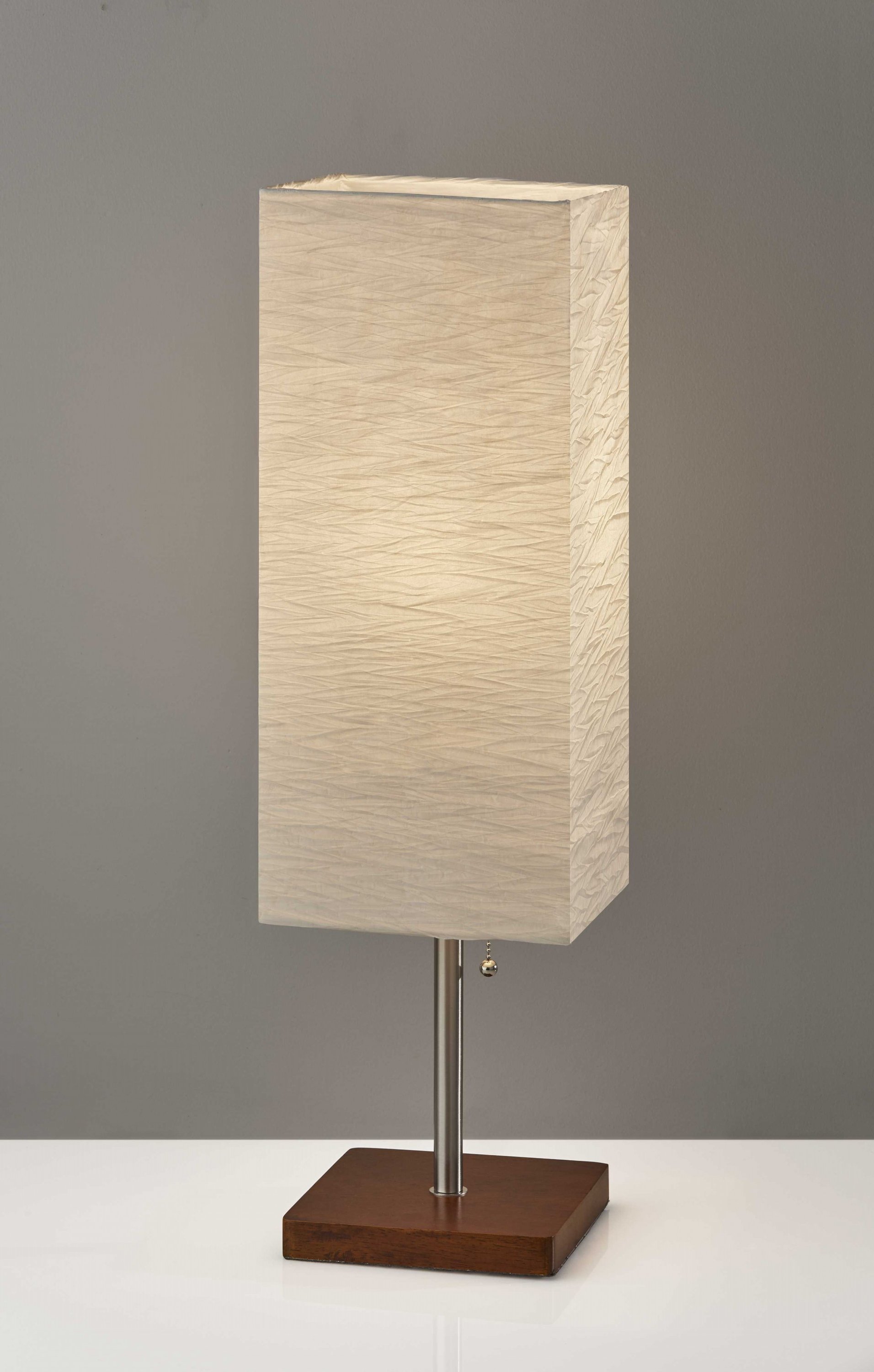Wildside Paper Shade Table Lamp featuring a natural wood base and crinkle paper shade, with satin steel accents and a pull-chain switch.